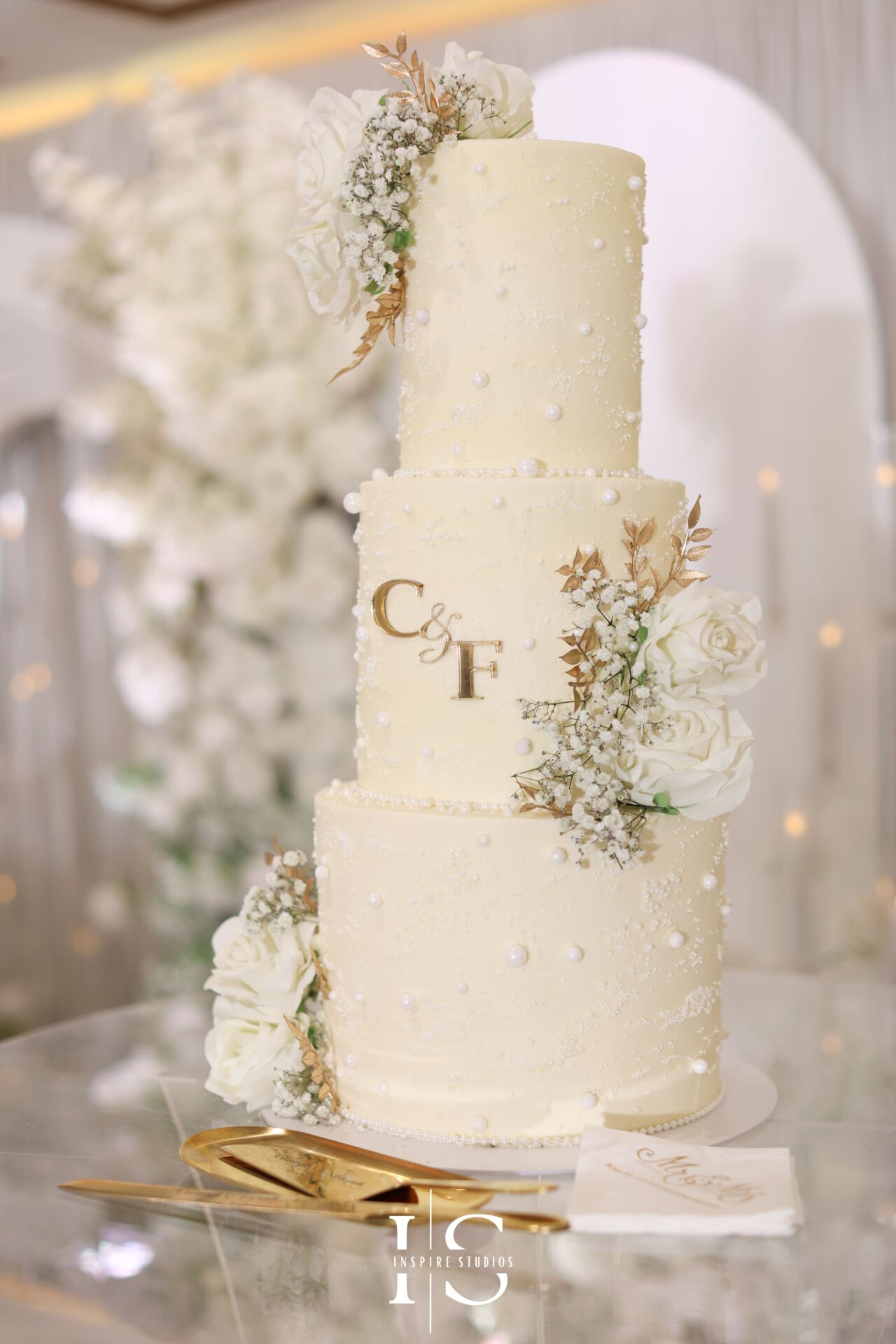Moroccan wedding cake decorated with gold patterns