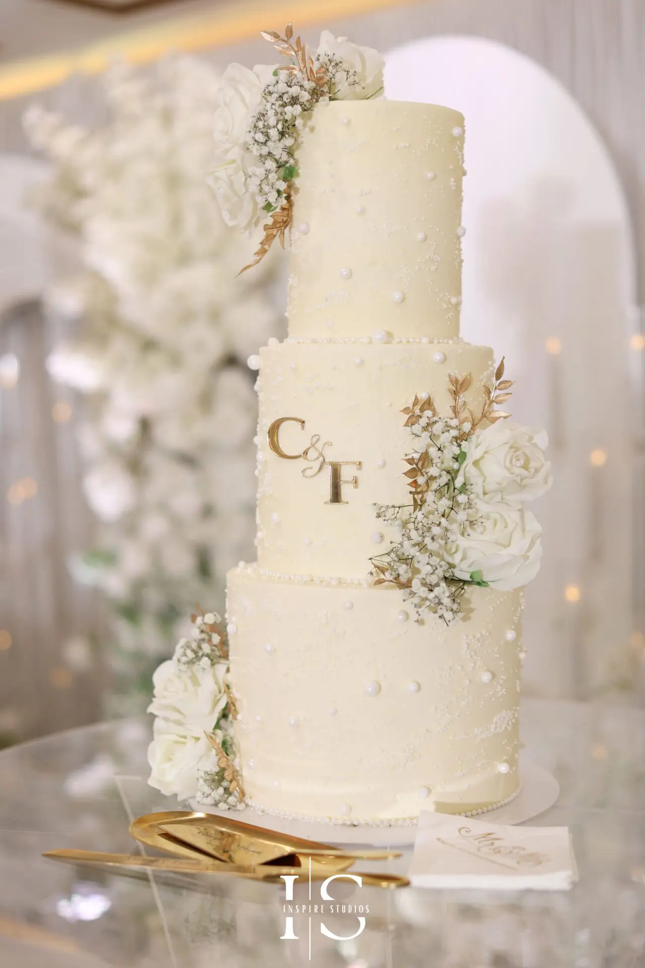 Moroccan wedding cake decorated with gold patterns