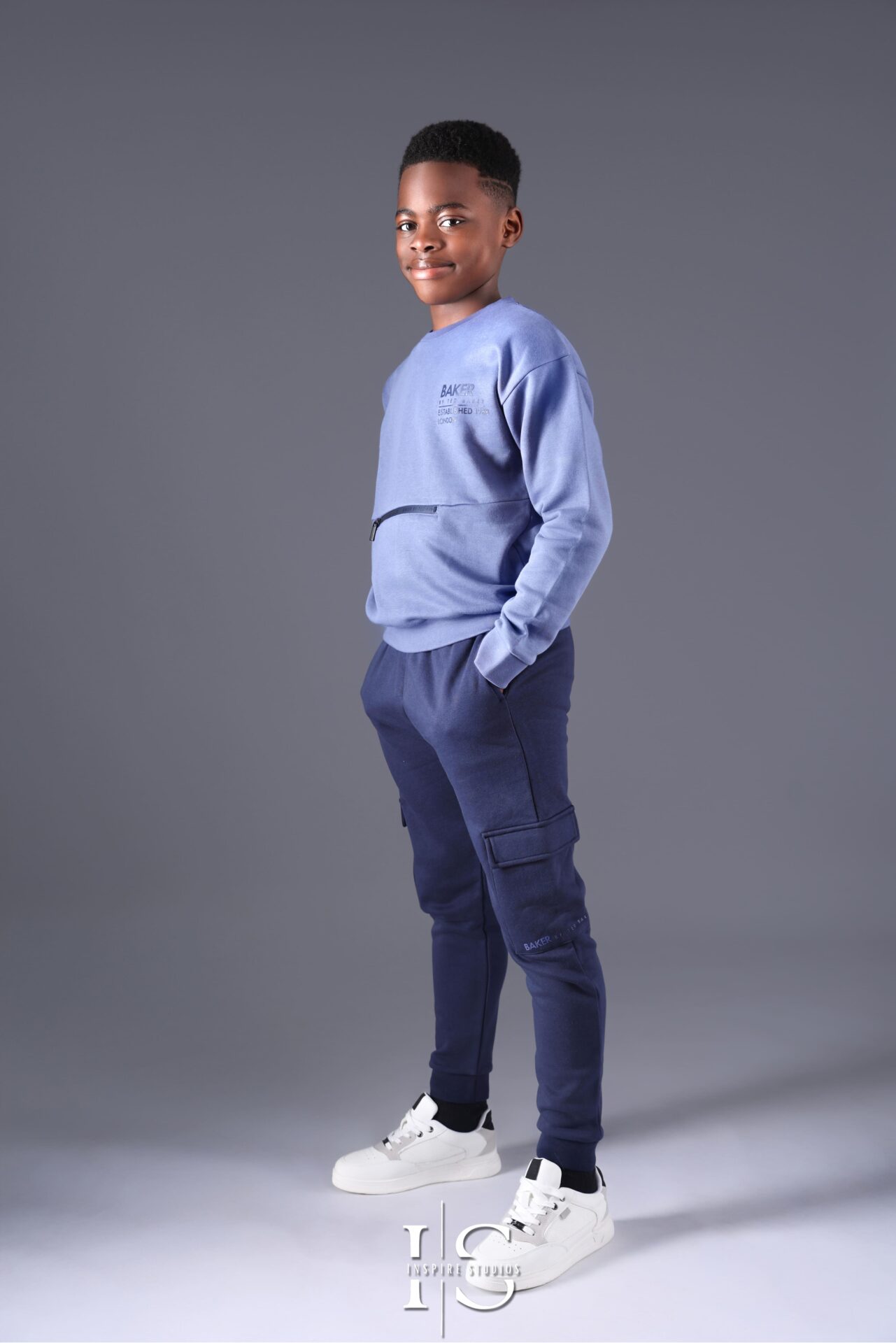 10-year-old child enjoying a milestone photoshoot in a London photography studio.