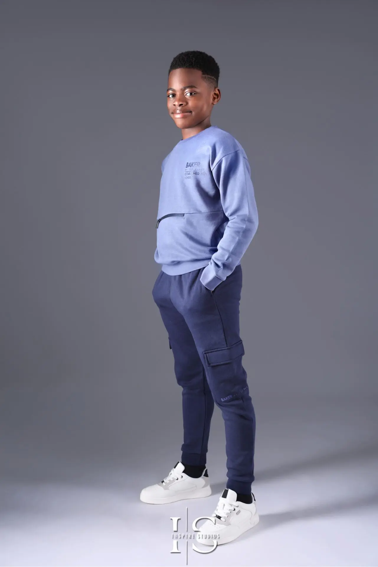 10-year-old child enjoying a milestone photoshoot in a London photography studio.