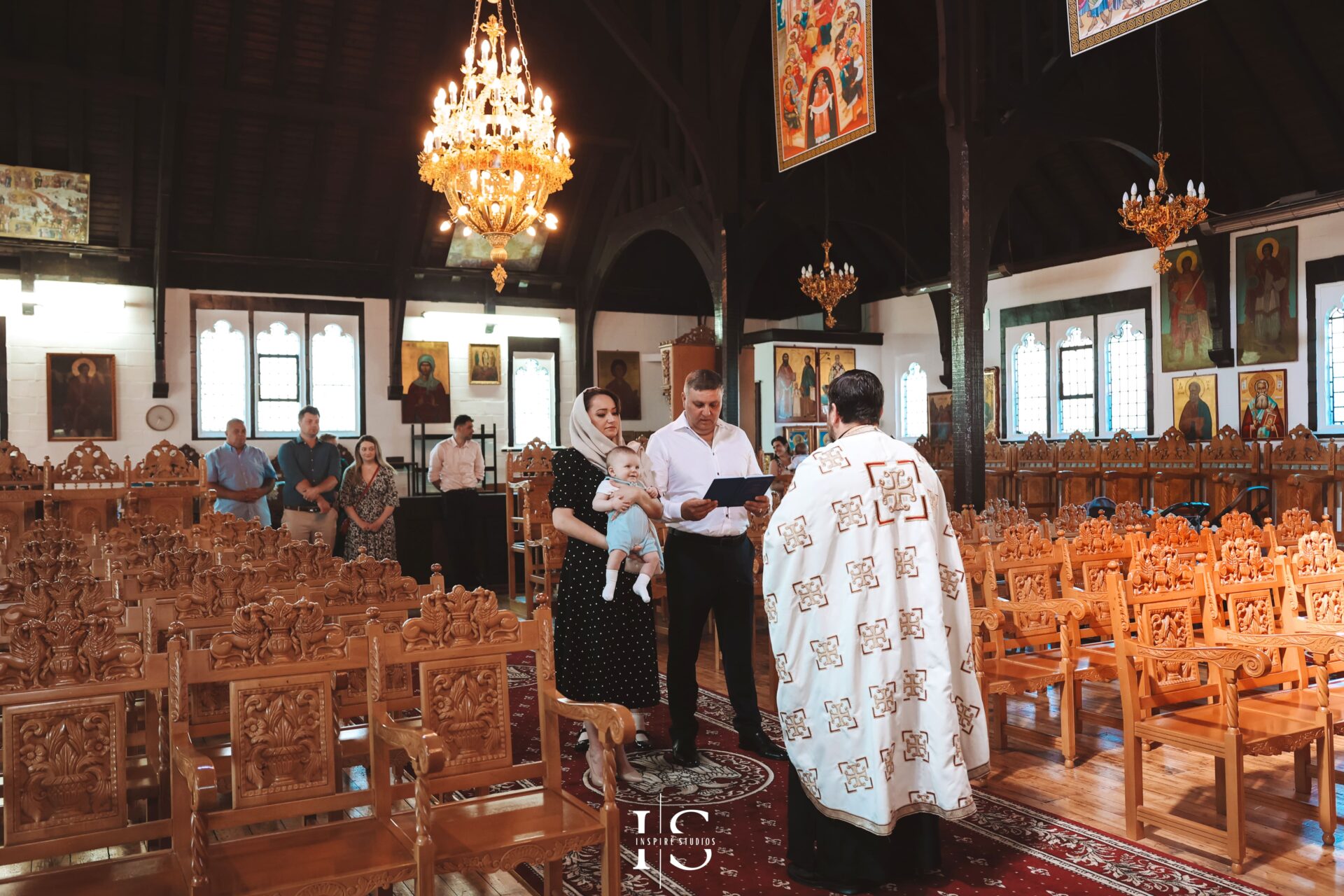 Natural light christening photography session in a London church