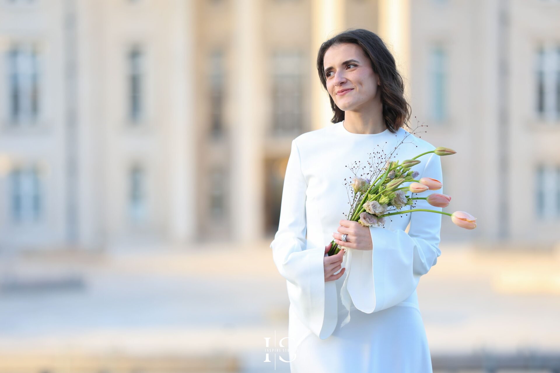 Bride and groom smiling during London registry wedding captured by female photographer