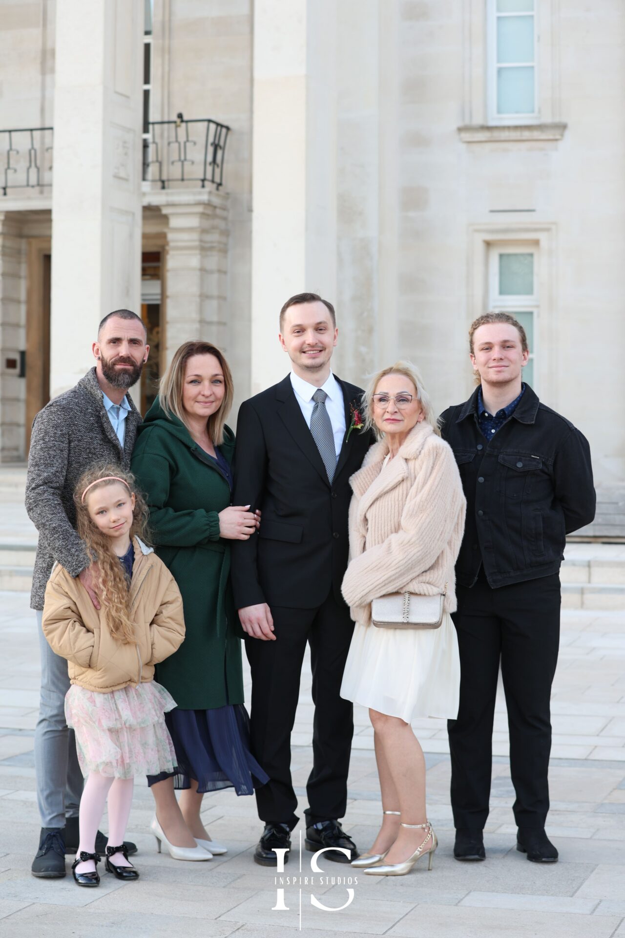 Groom posing with family at Walthamstow Town Hall