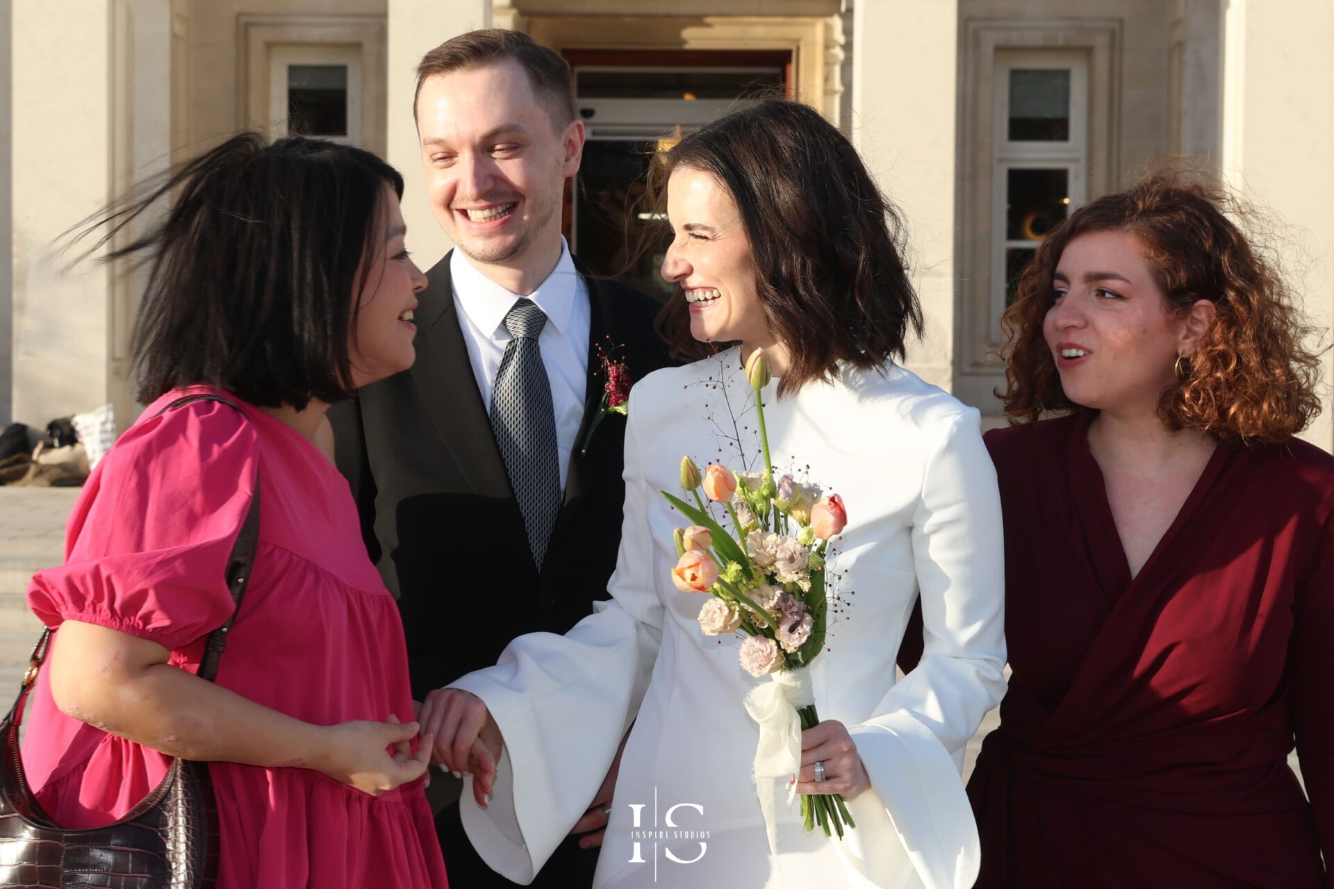 Bride with close friends after London registry ceremony