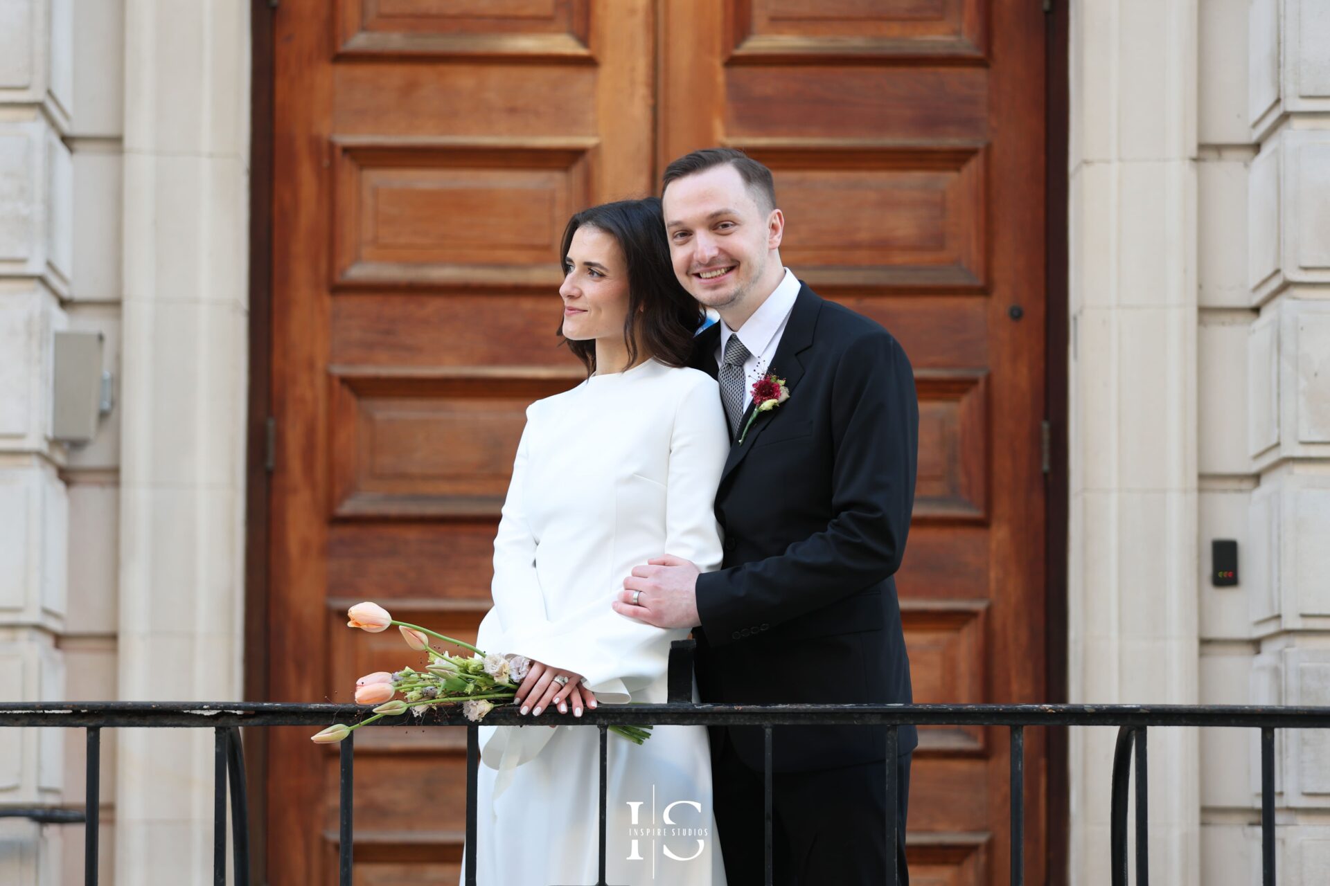 Bride and groom sharing quiet moment after registry wedding