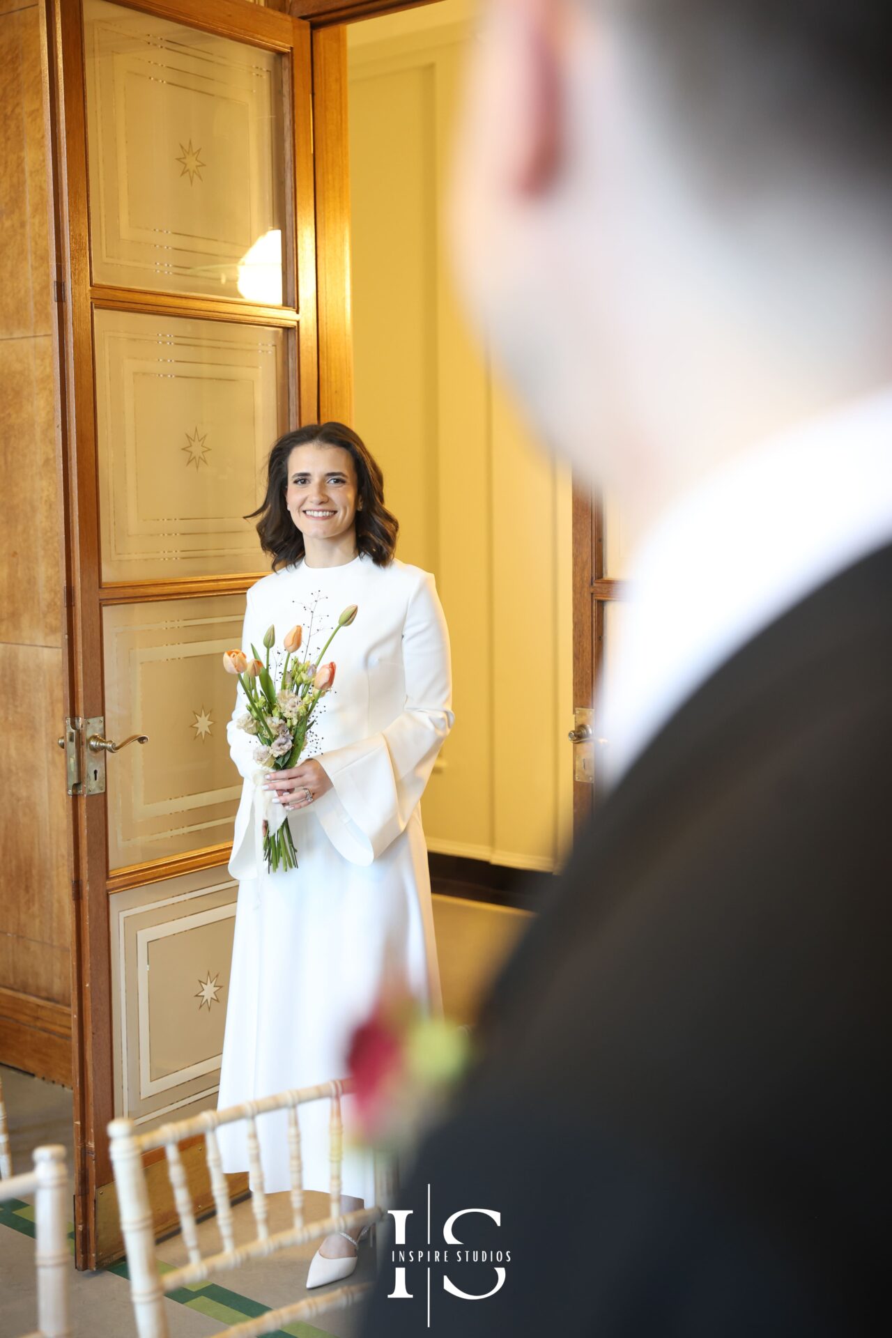 Bride arriving for her registry ceremony at Walthamstow Town Hall