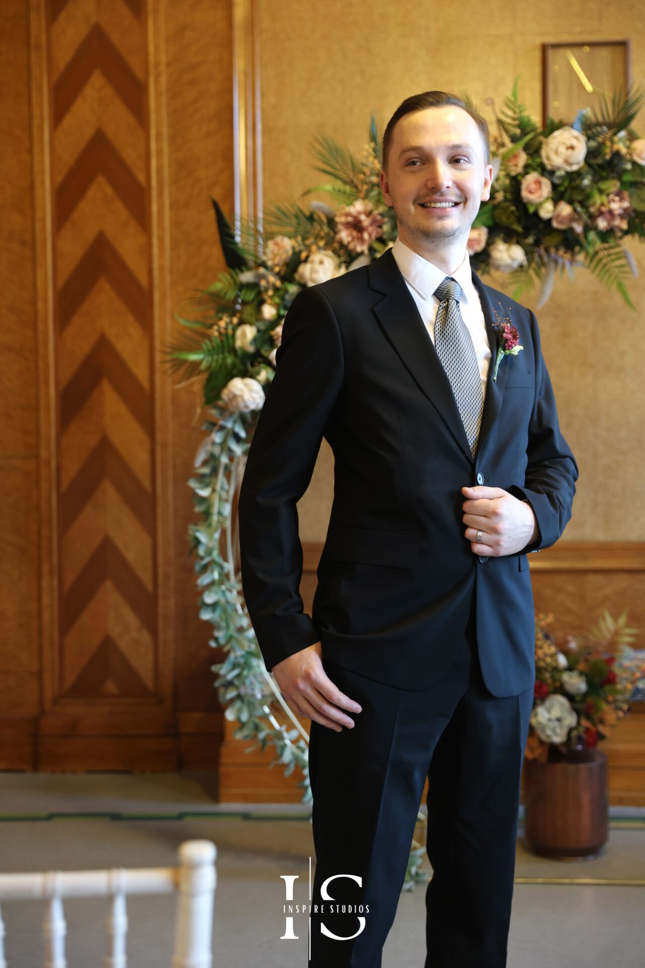 Groom portrait taken outside Walthamstow Town Hall before ceremony