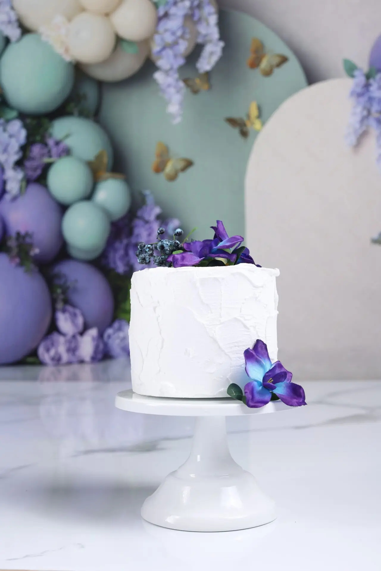 Themed dummy birthday cake with pastel colors for child photoshoot