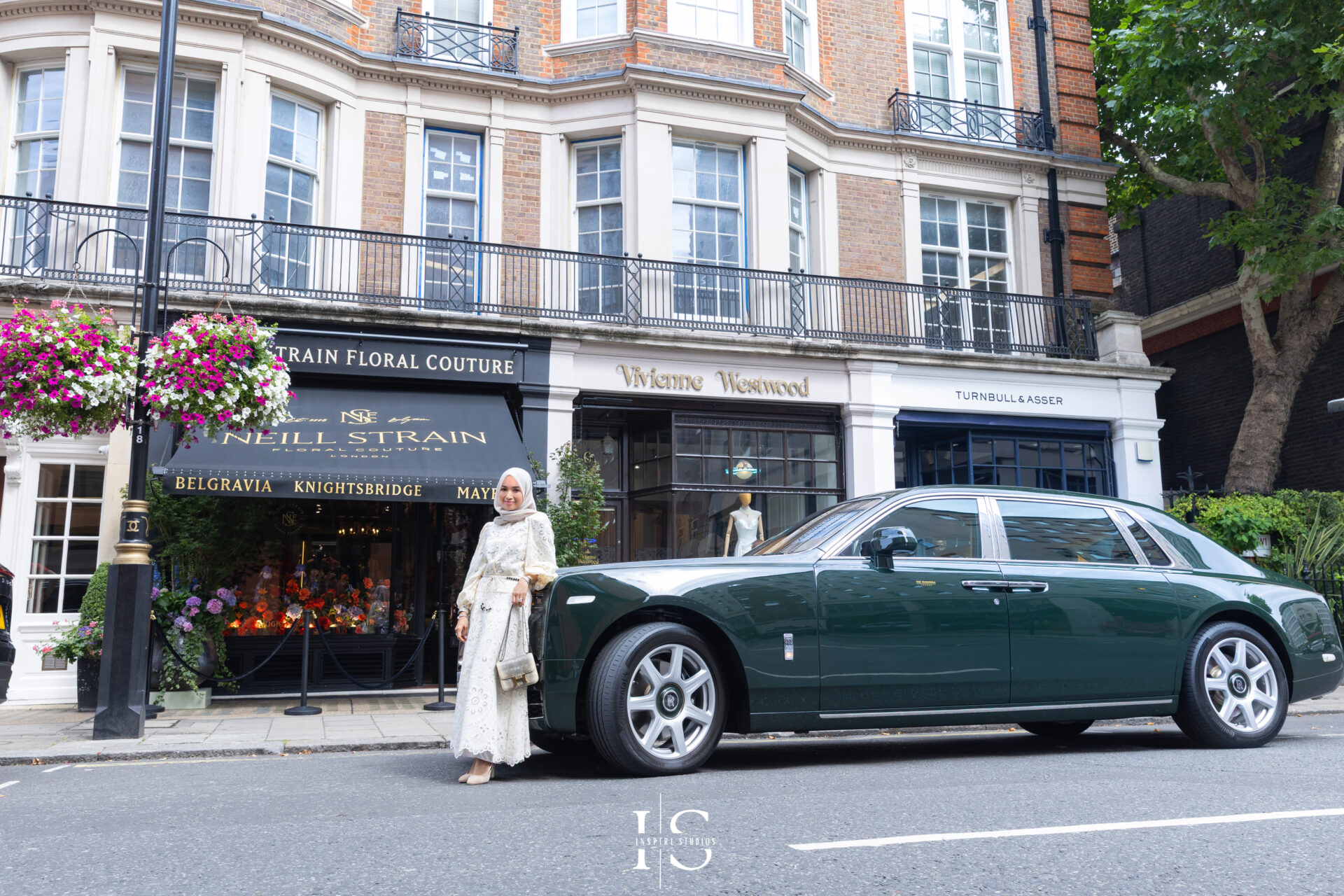 Portrait of birthday girl Naja outside Neill Strain Floral Couture Mayfair luxury floral boutique.