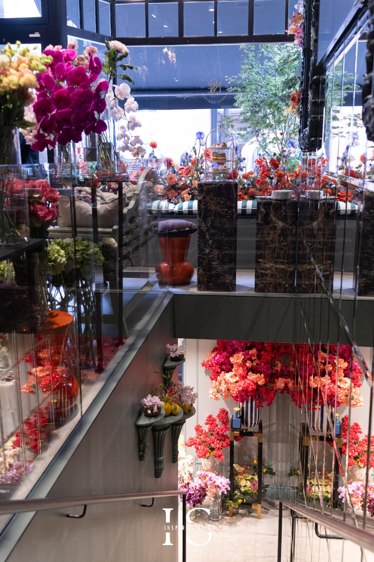 Candid moment during luxury birthday event at Neill Strain Floral Couture Mayfair with elegant floral décor.