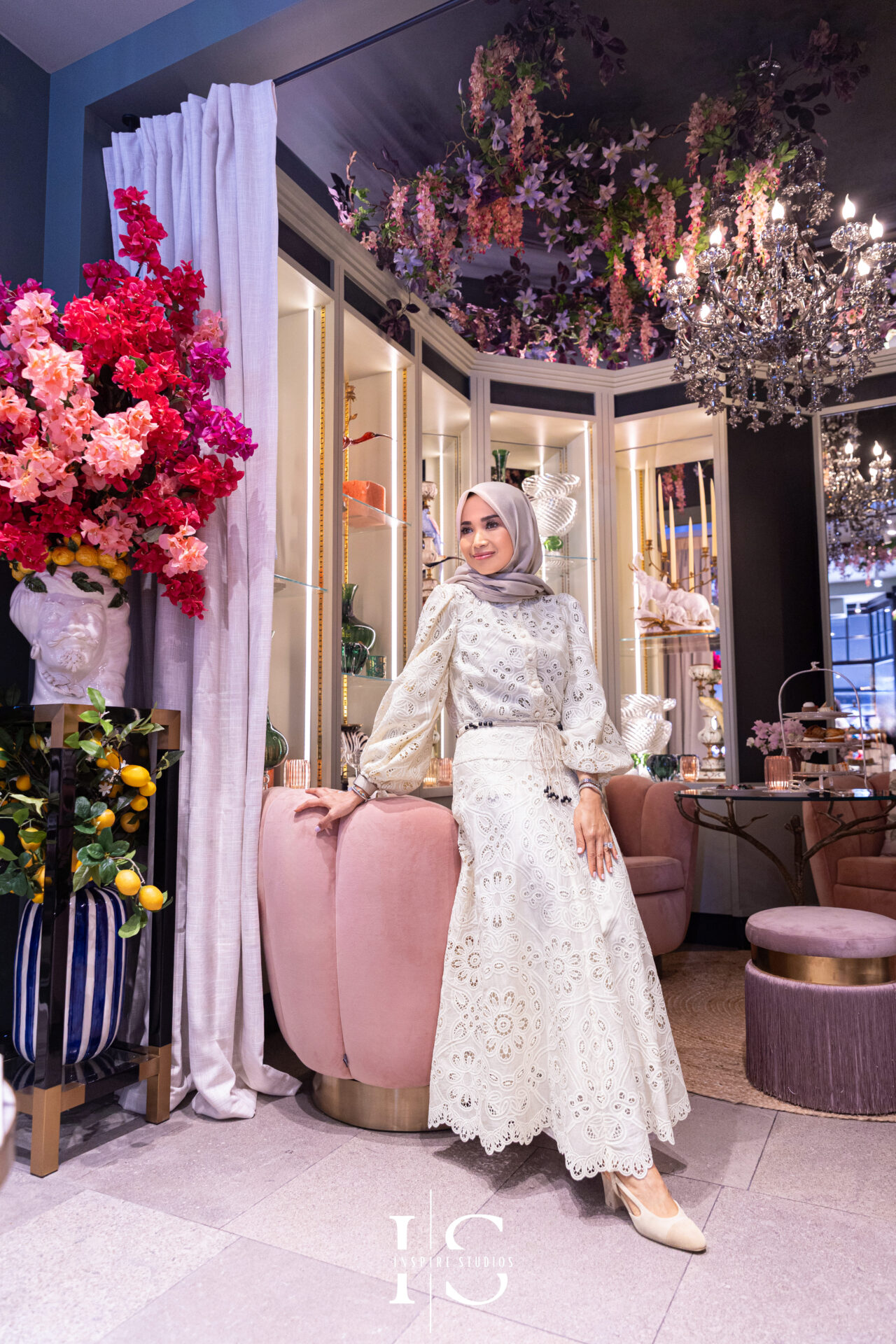 Elegant birthday portraits of Naja inside Neill Strain Floral Couture Mayfair with floral backdrop.