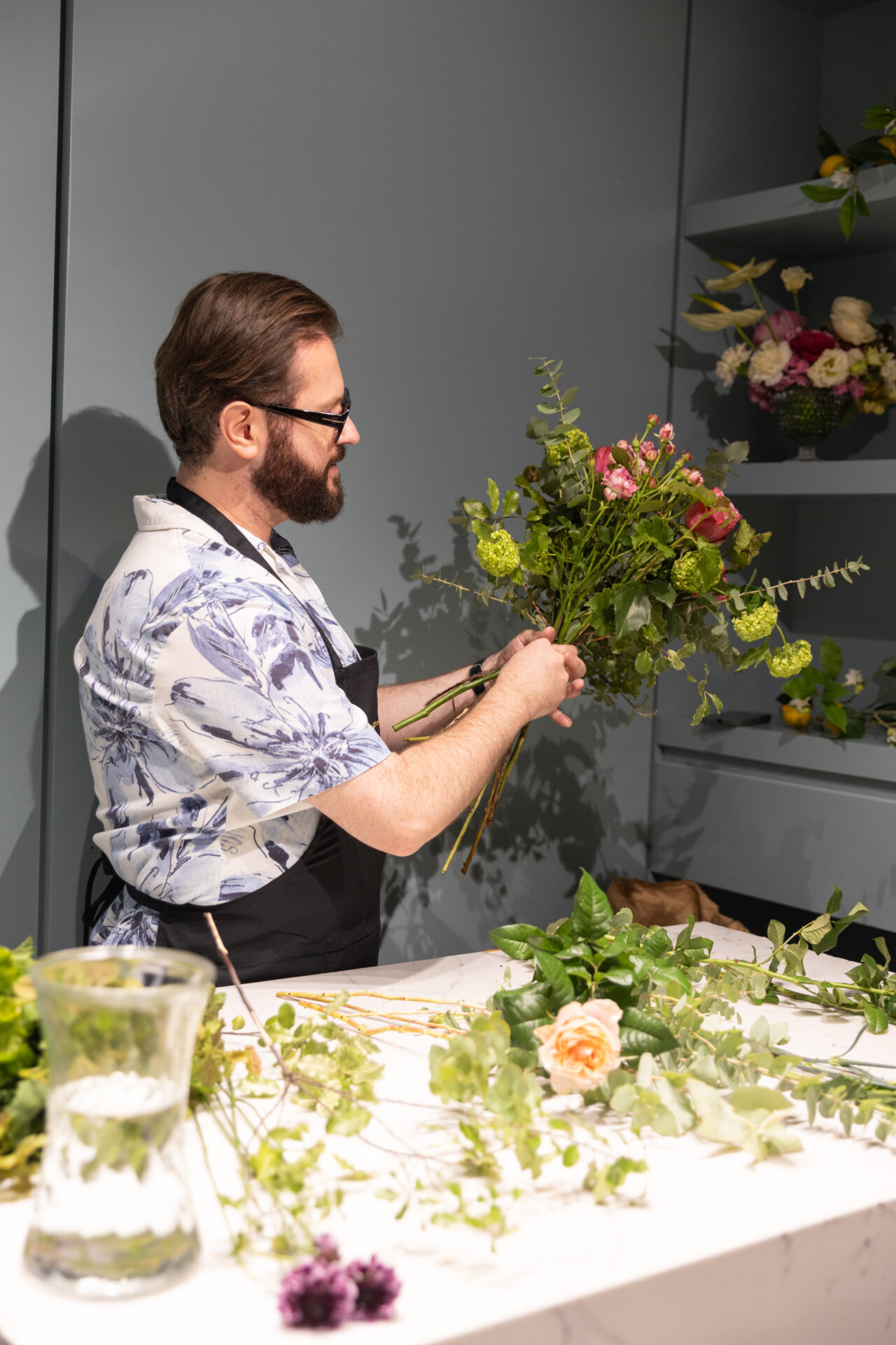 Neill Strain leading a floral workshop at his Mayfair boutique.