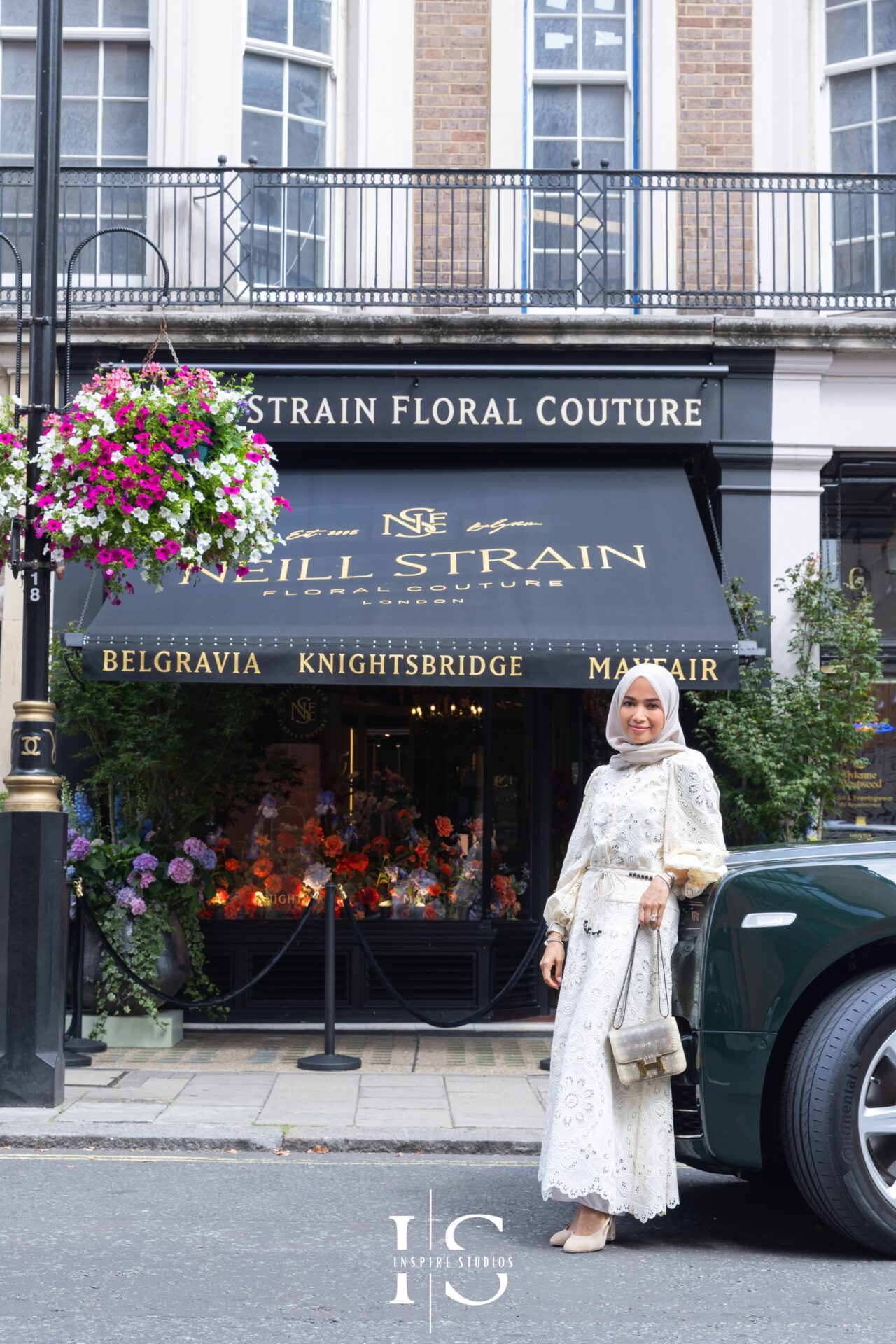 Birthday portraits outside Neill Strain Mayfair floral couture boutique.