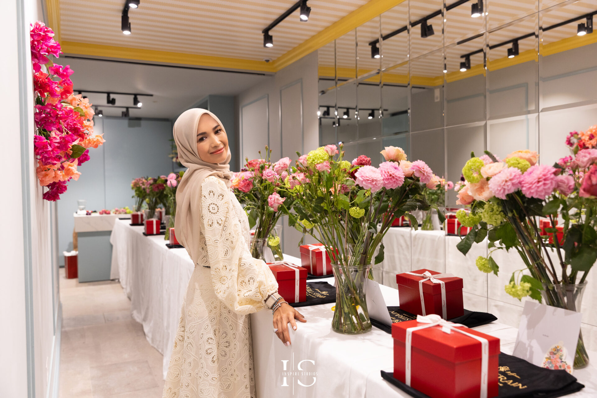 Birthday event portrait of Naja, styled with floral elegance in Mayfair.