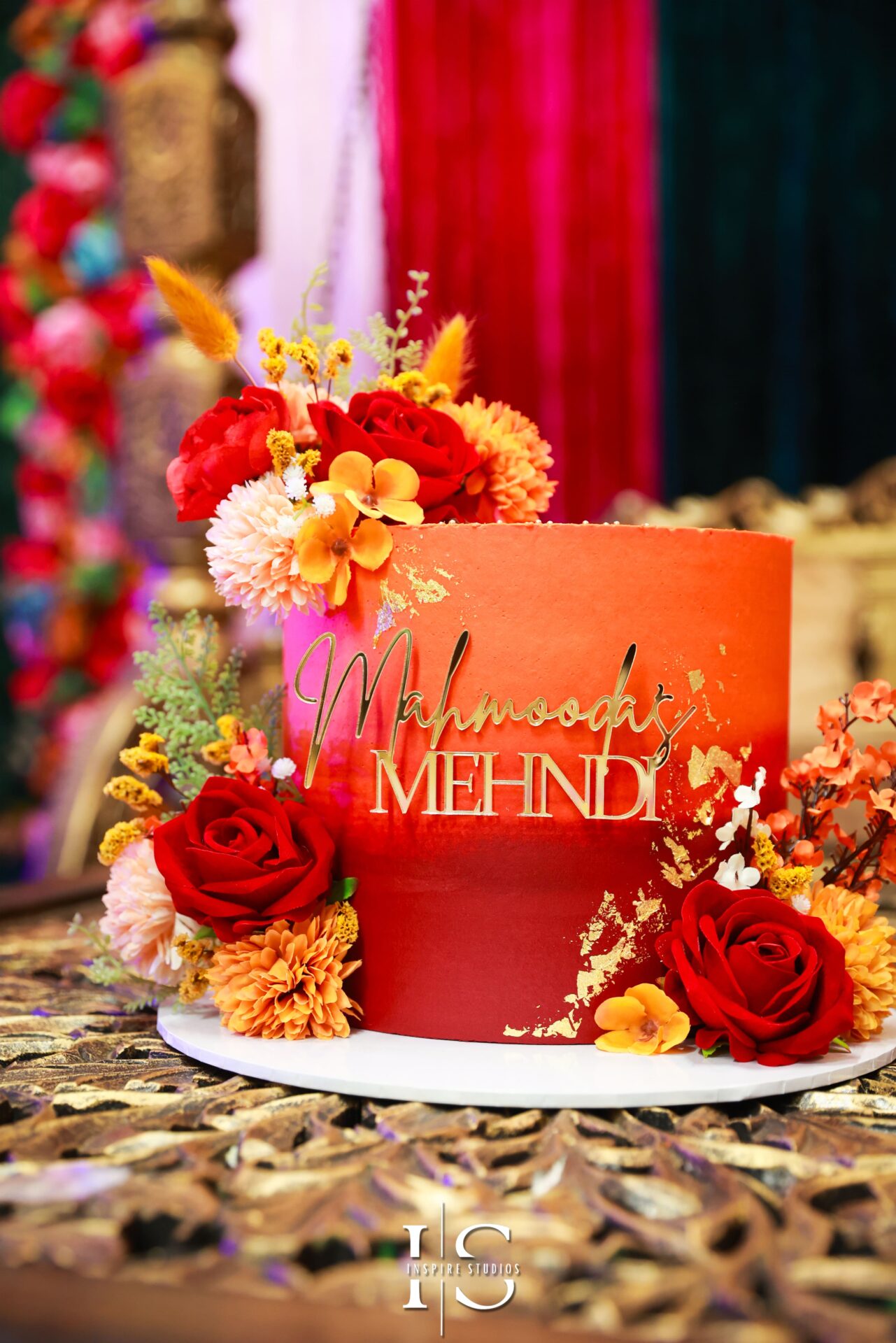 Henna application during a colourful Mehndi event in London.