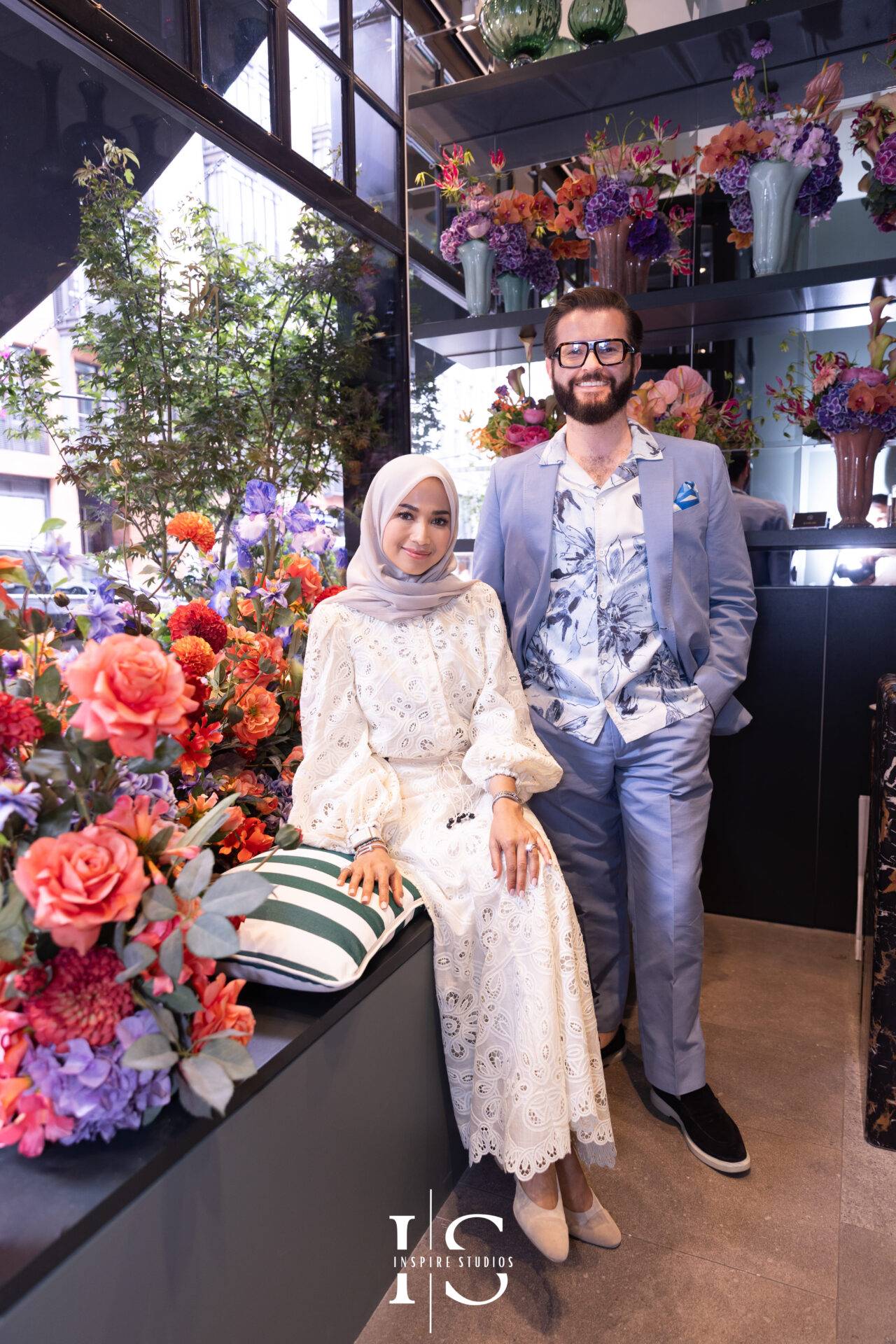Neill Strain and birthday guest Naja during Mayfair floral celebration.
