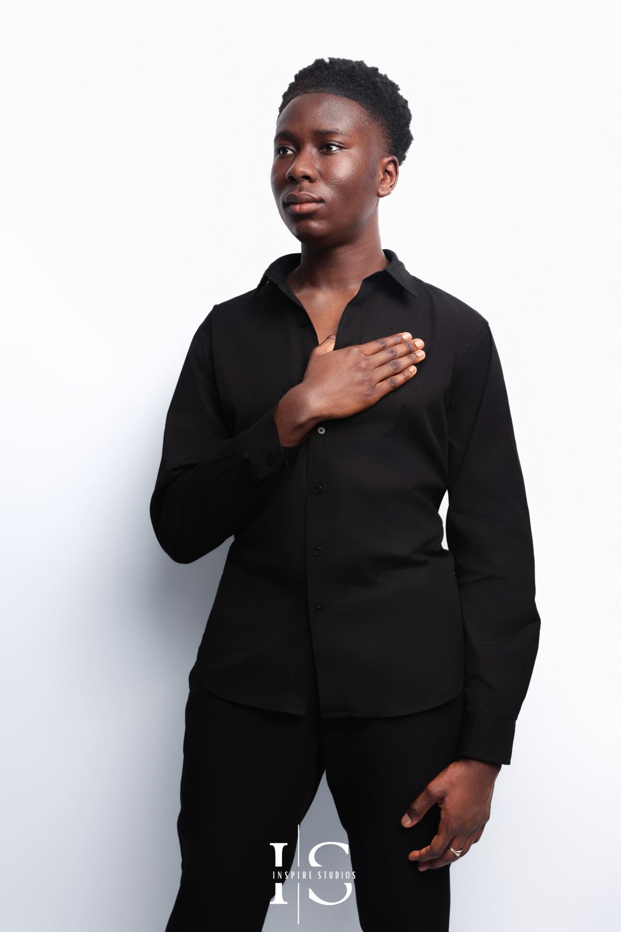 Professional studio portrait of 18‑year‑old man in smart‑casual outfit, London