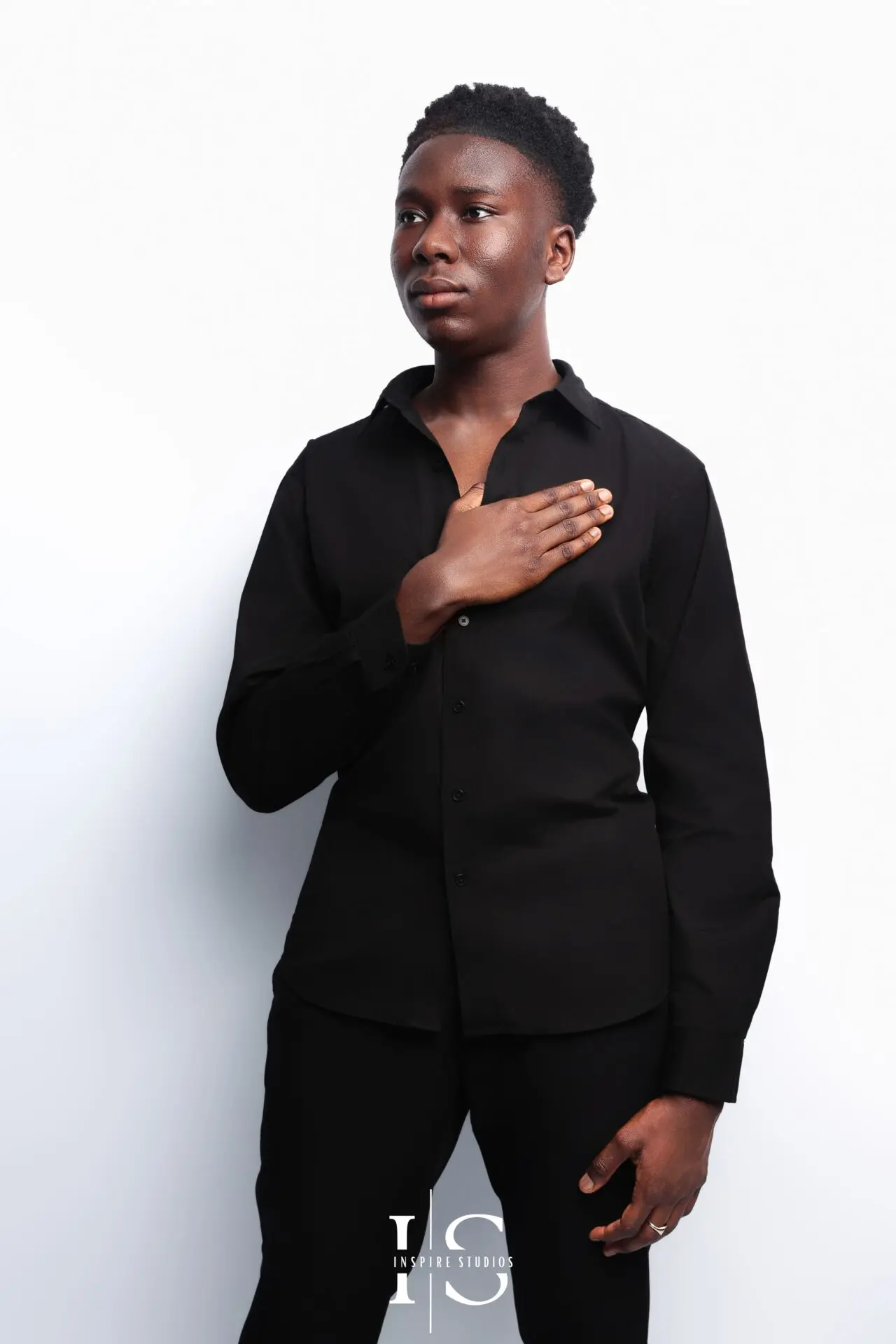 Professional studio portrait of 18‑year‑old man in smart‑casual outfit, London
