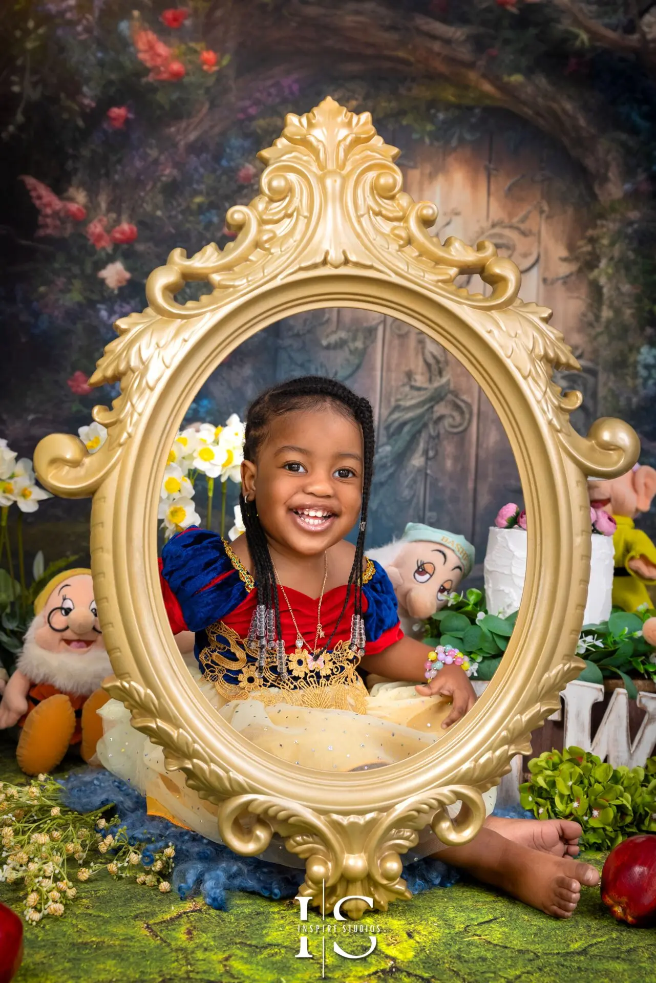 Girl celebrating her birthday in Snow White costume during a themed photoshoot