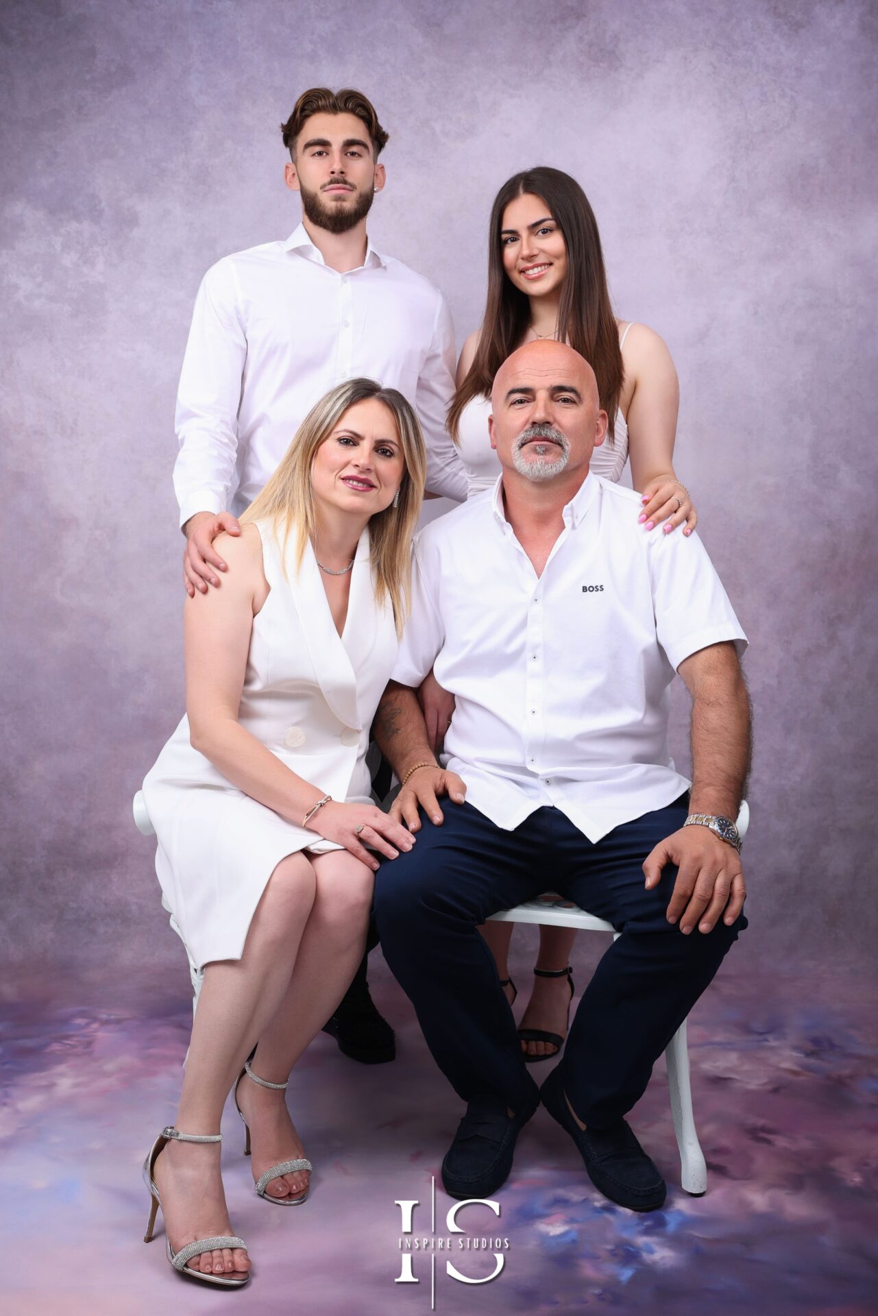 Elegant Albanian family photographed in a London studio photoshoot