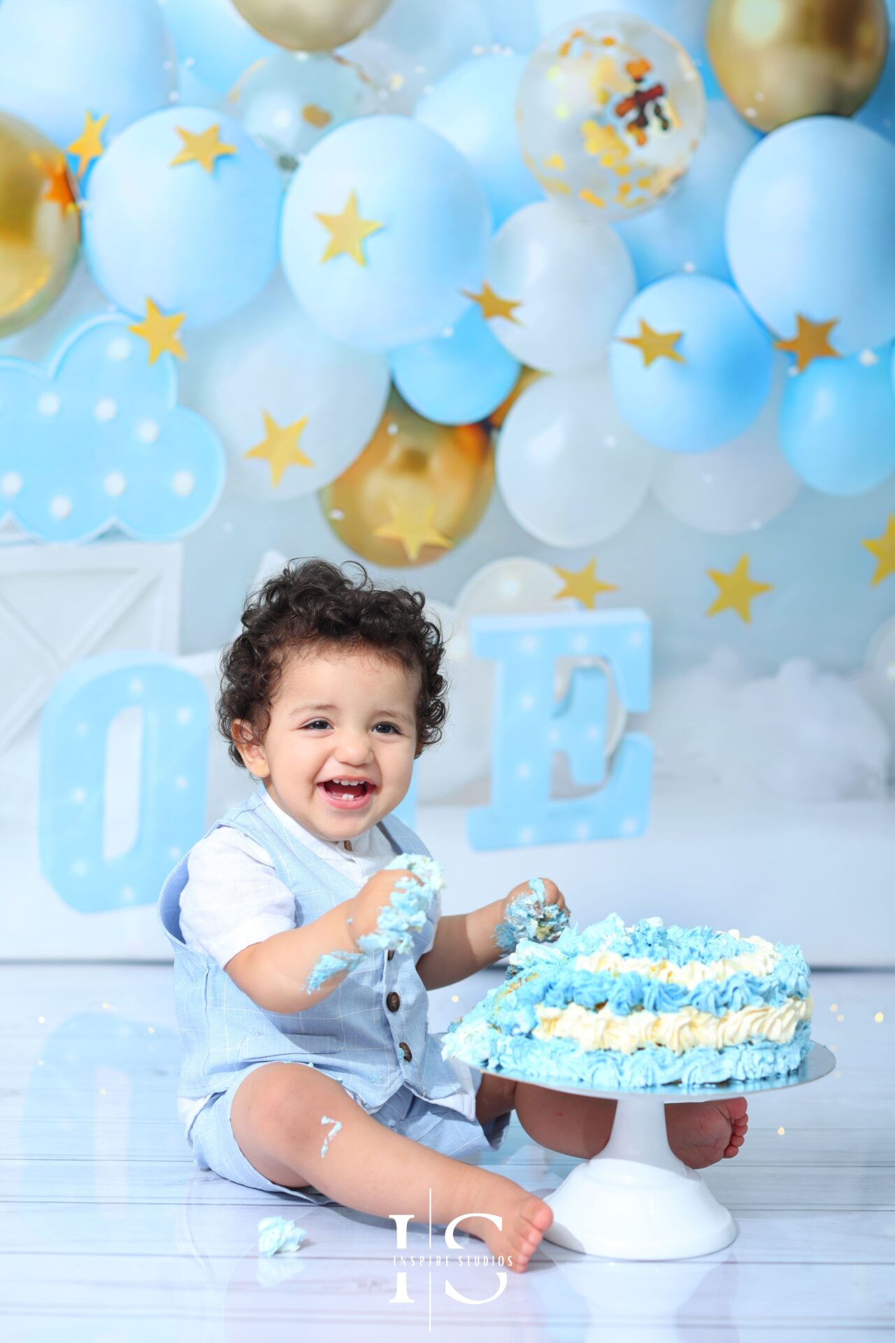 Baby boy during a first-year smash-the-cake photoshoot in London