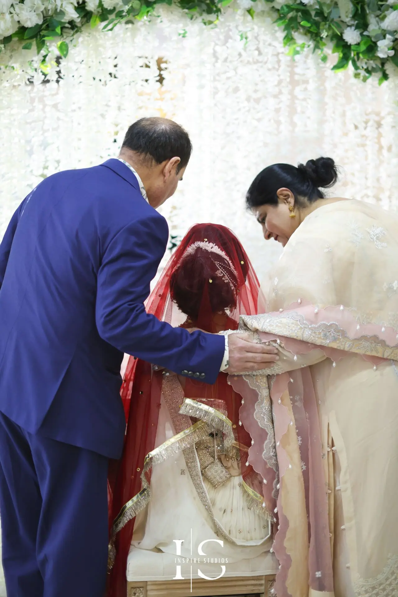 Bride with family captured by female wedding photographer London