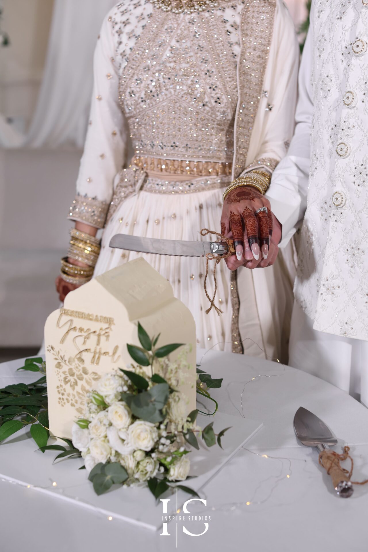 Bride and groom cut their wedding cake – Nikkah celebration in Ilford