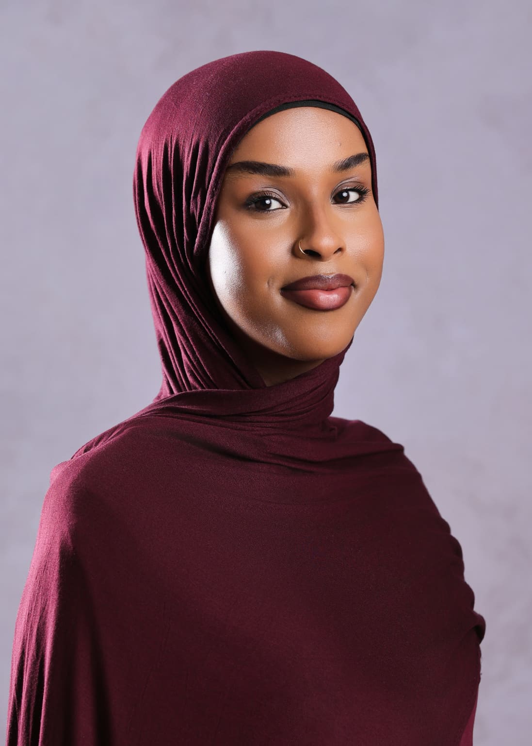 Executive headshot of a business professional with modern portrait style