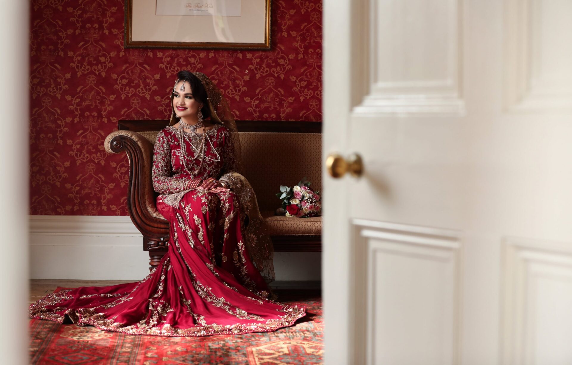 Female wedding photographer capturing wedding at Fennes
