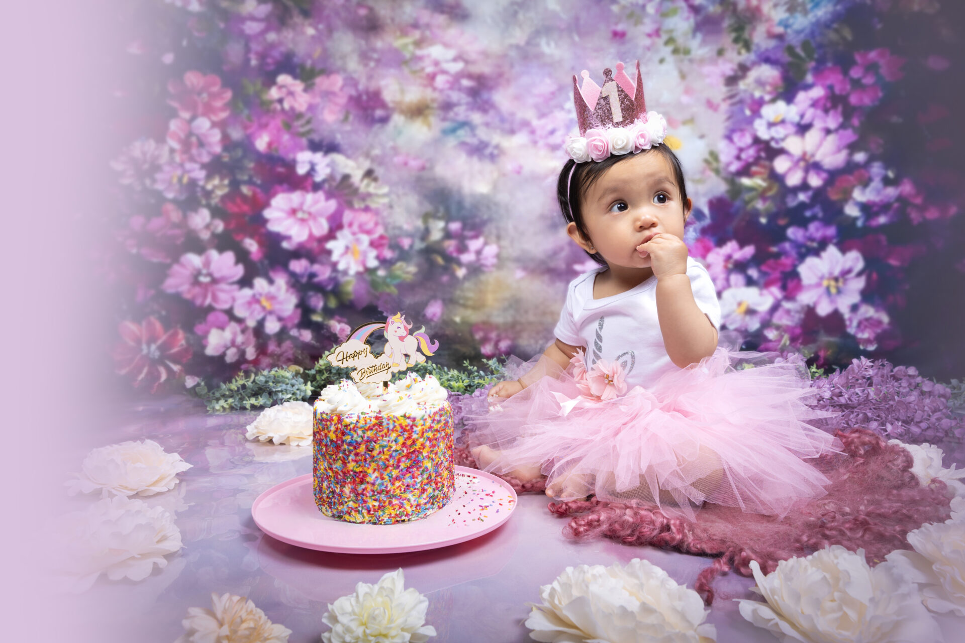 First birthday photoshoot for a Filipino family in London capturing joyful milestone moments