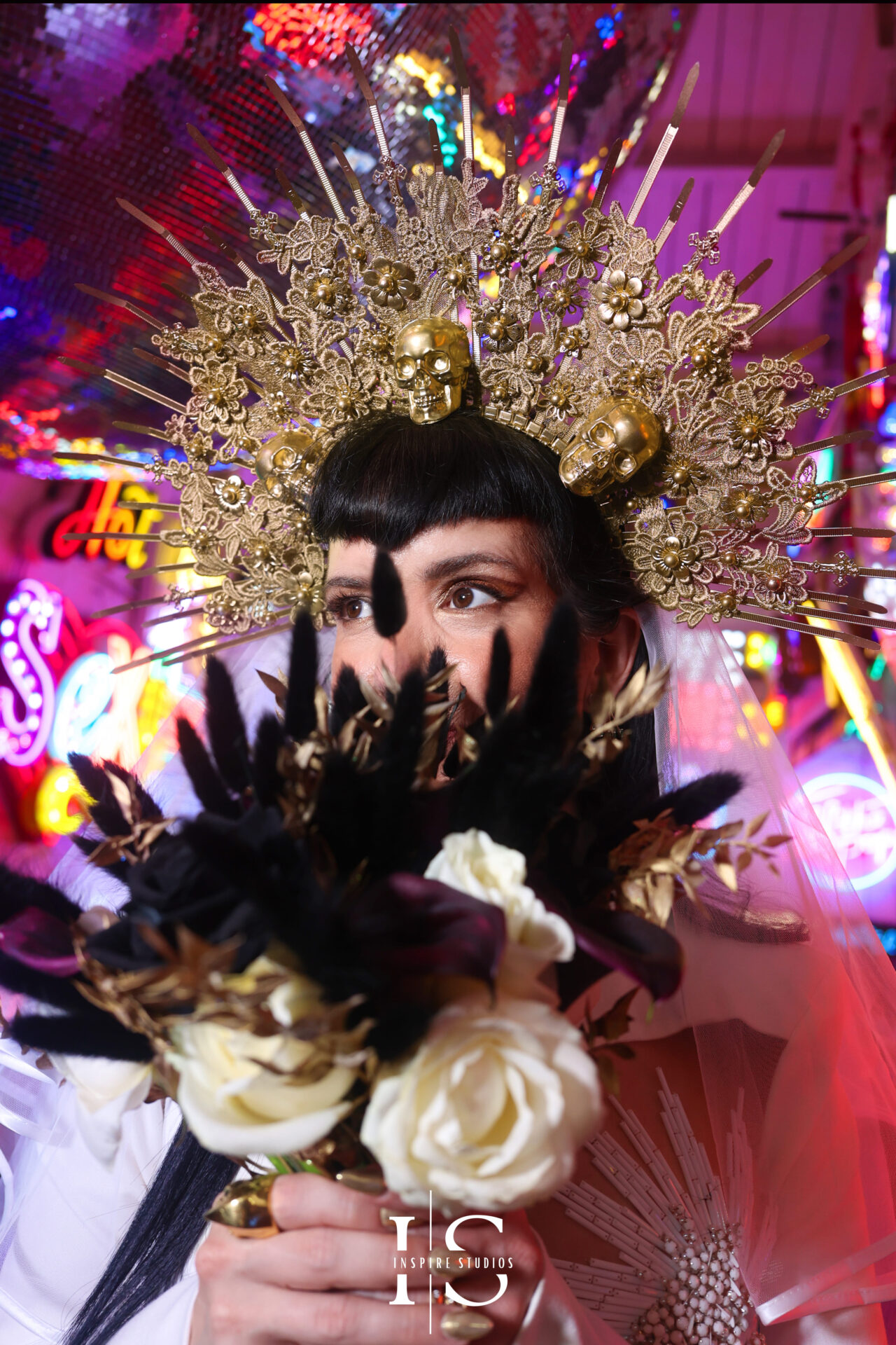Bride entering ceremony with bouquet at Gods Own Junkyard punk wedding venue