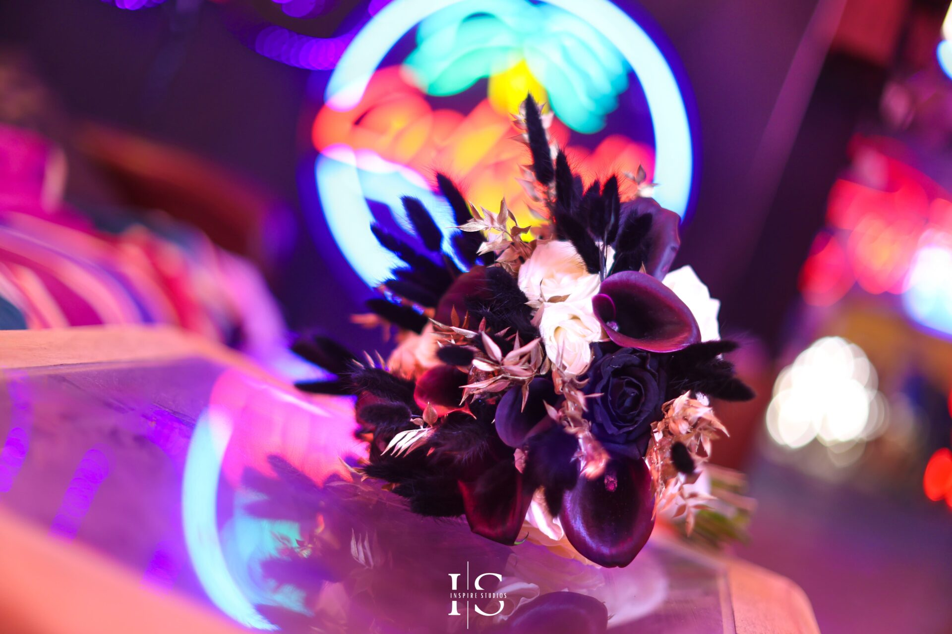 Bride holding a colourful bouquet at God’s Own Junkyard wedding in London