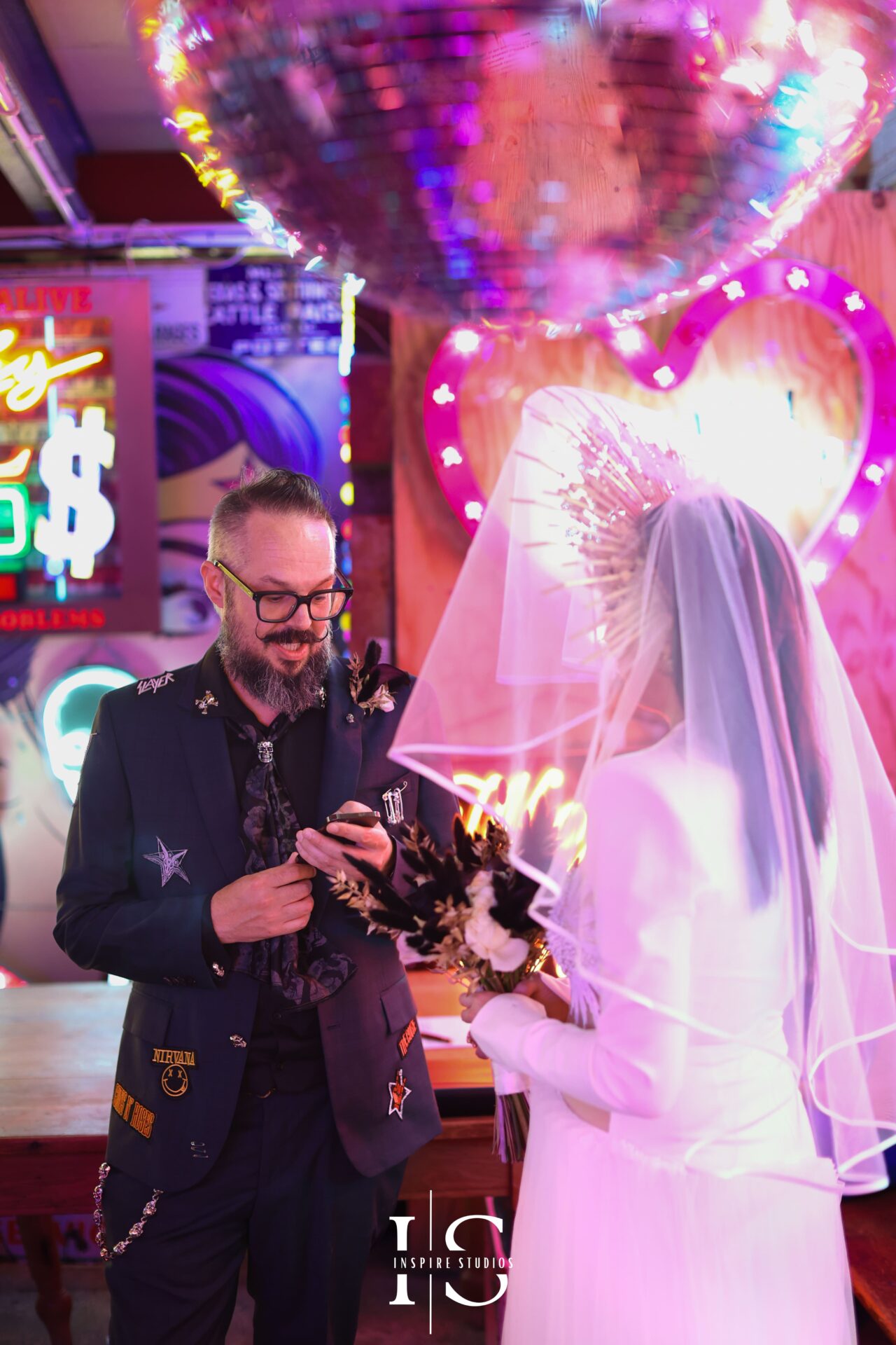 Bride and groom exchanging wedding vows at Gods Own Junkyard venue London