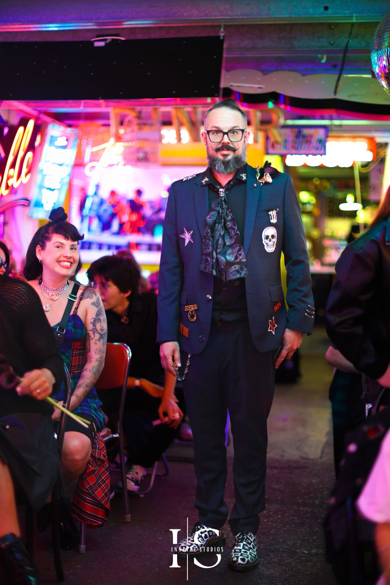 Groom entering wedding venue Gods Own Junkyard Walthamstow with punk style