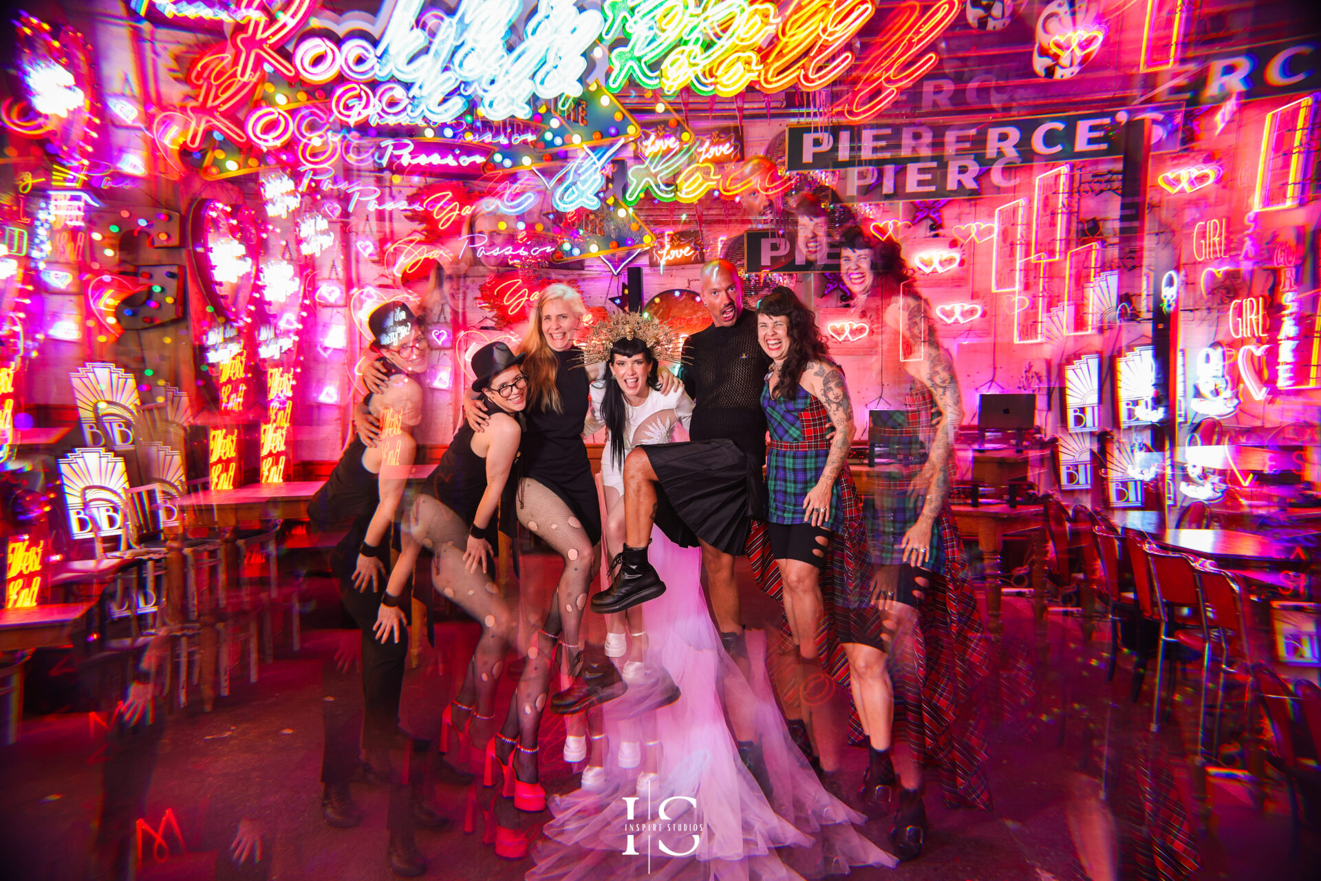 Wedding bride and friends kaleidoscope photoshoot in Gods Own Junkyard neon venue