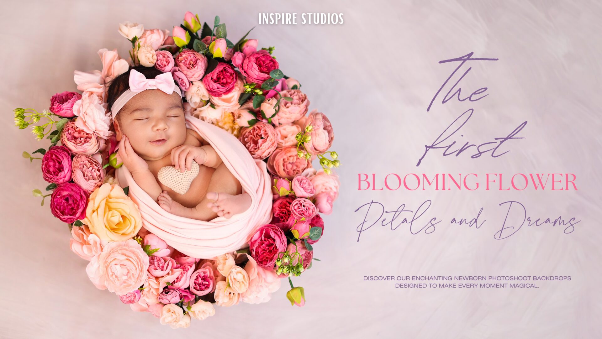 London newborn baby photoshoot with baby girl in styled studio setting.