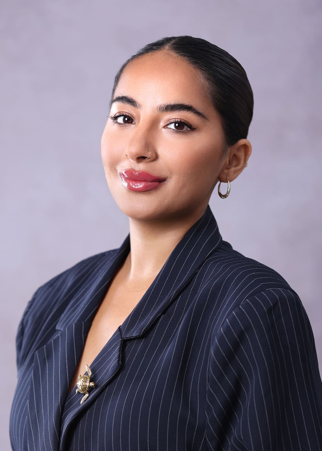 Personal branding headshot of a professional showcasing confidence and approachability