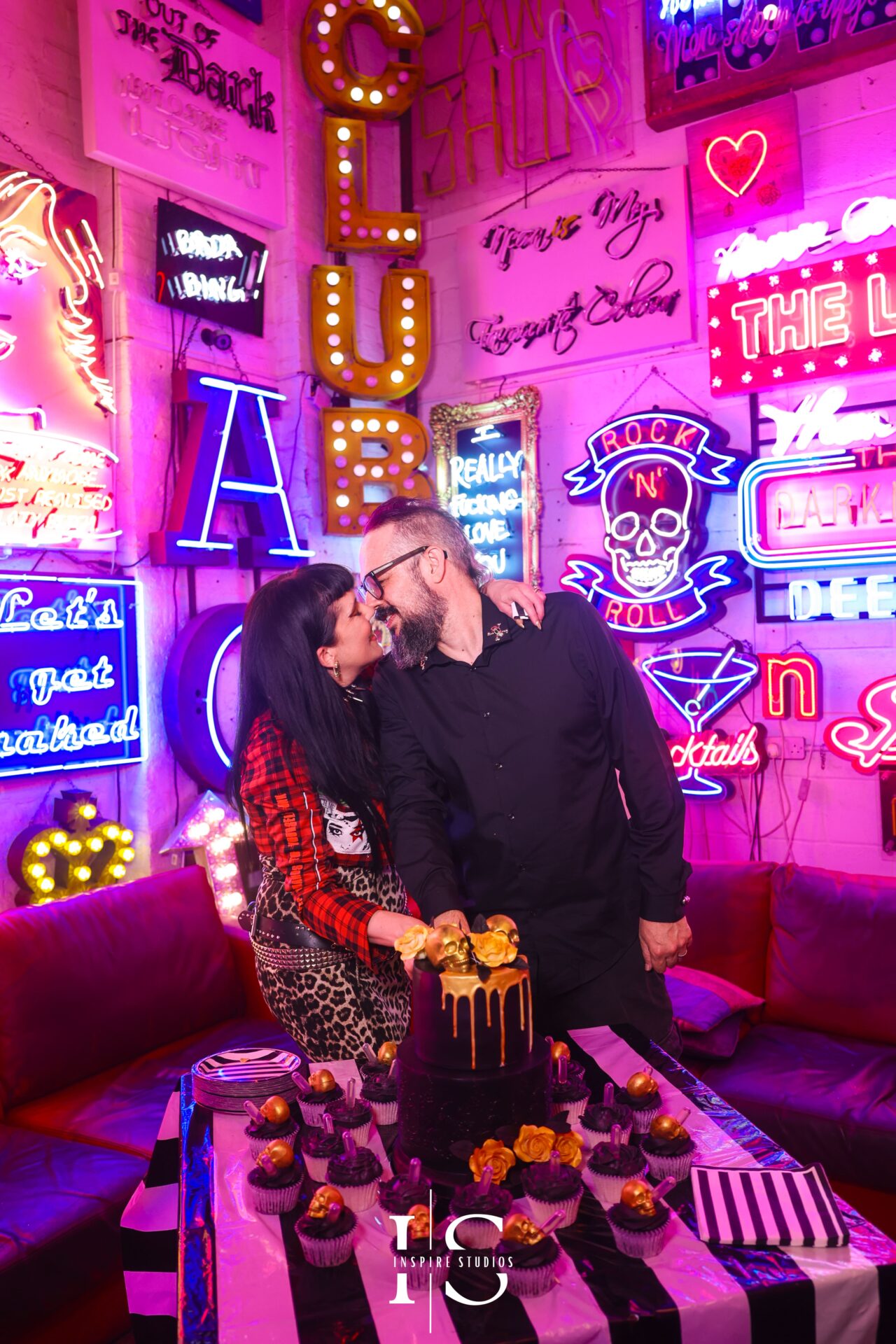 Alternative punk wedding cake cutting ceremony London couple