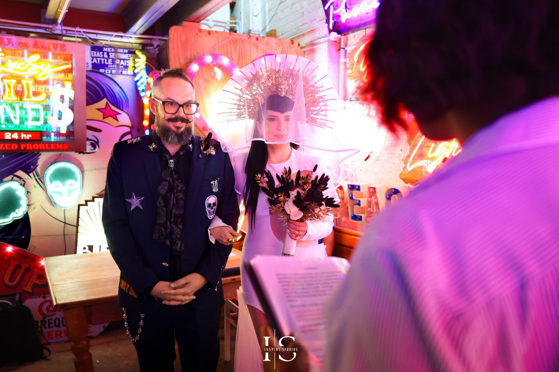 Registry wedding photography at Gods Own Junkyard Walthamstow with neon art backdrop