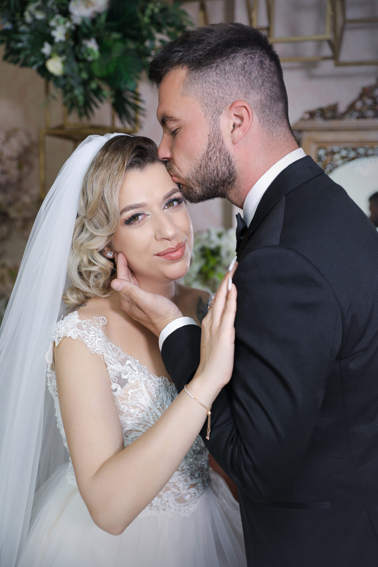 Romanian female wedding photographer capturing a Christian ceremony