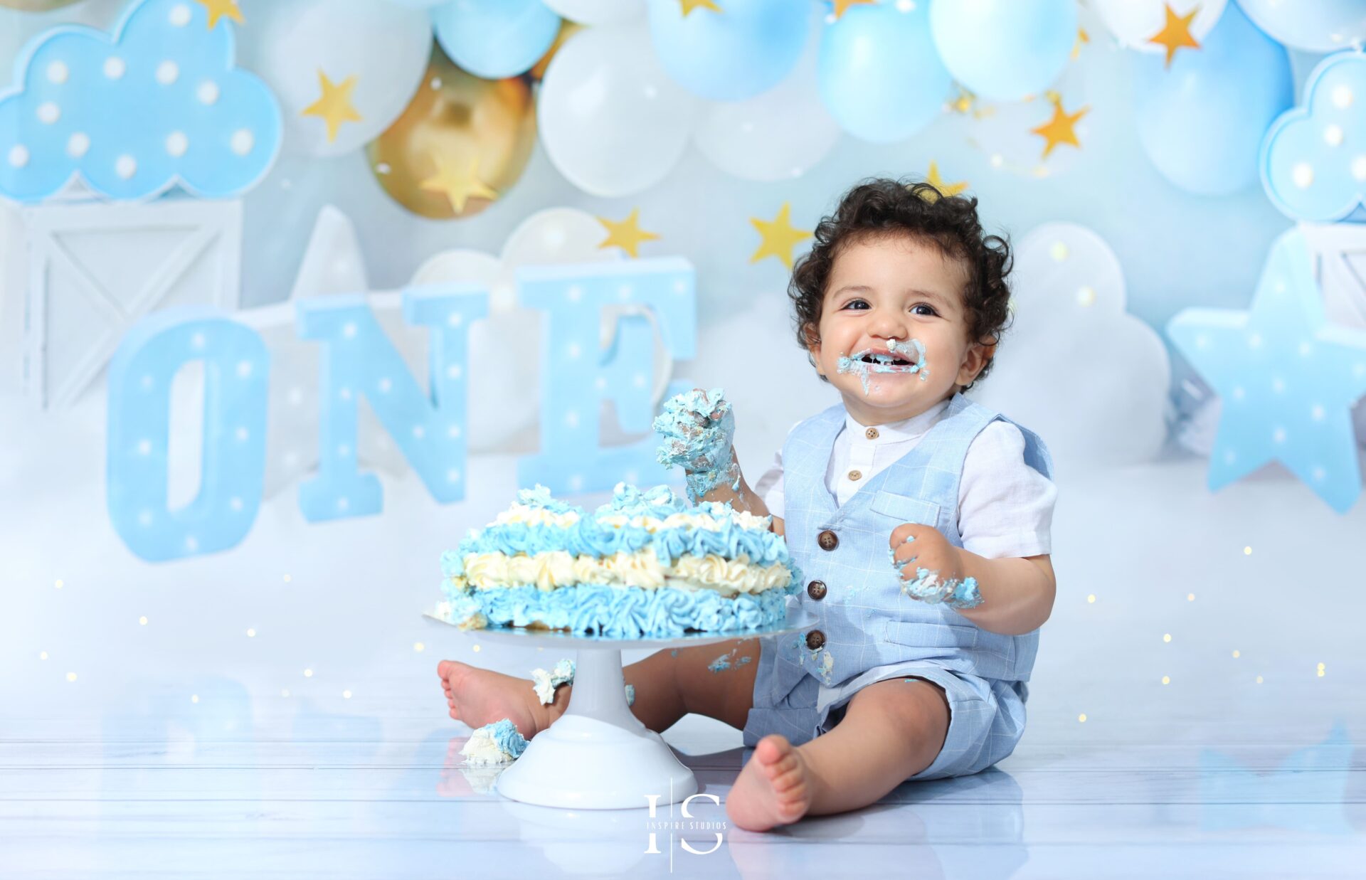 Baby having a smash the cake studio photoshoot at Inspire Studios, London