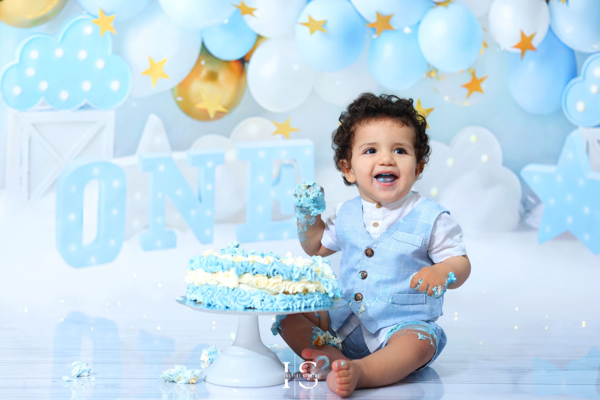 Baby enjoying a smash the cake studio session at Inspire Studios, London