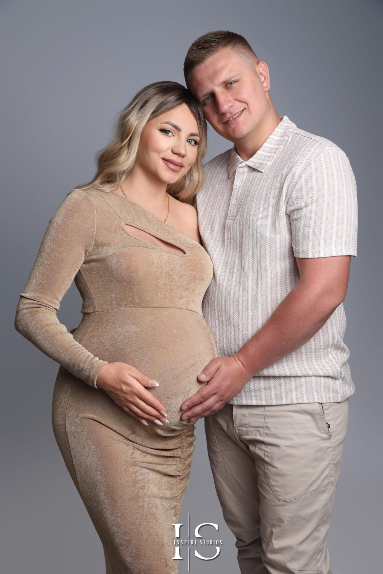 Pregnant woman posing in a London studio maternity photoshoot