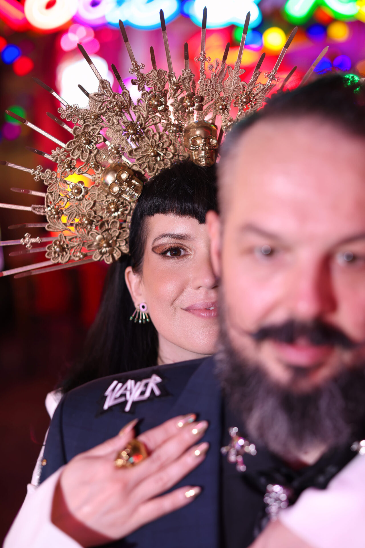 Couple photoshoot at Gods Own Junkyard neon wedding venue London