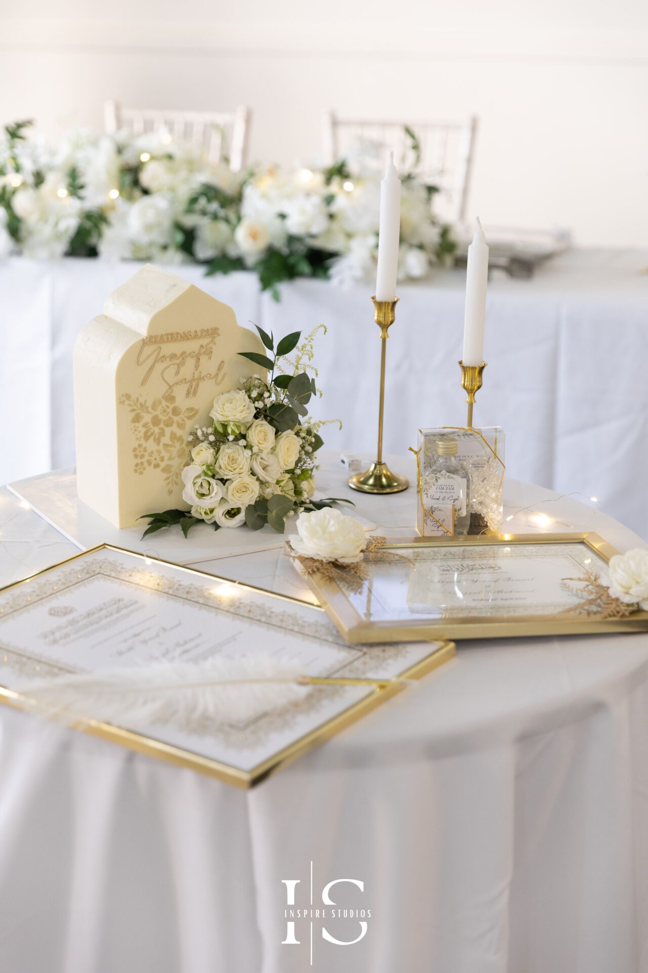 Wedding hall setup for Nikkah ceremony and cake display at Crown Banqueting Ilford
