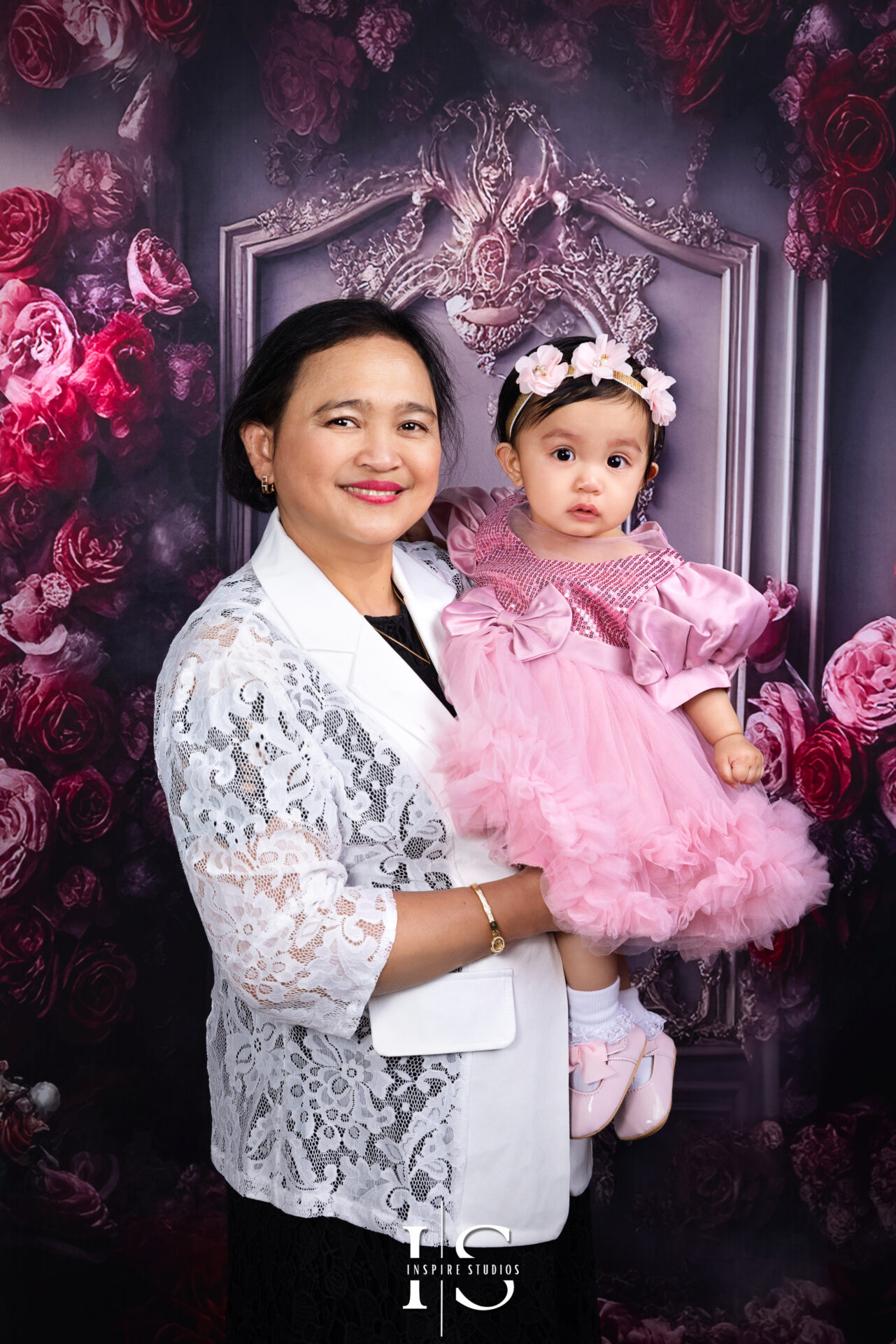 Filipino family photoshoot in a London studio capturing joyful moments together