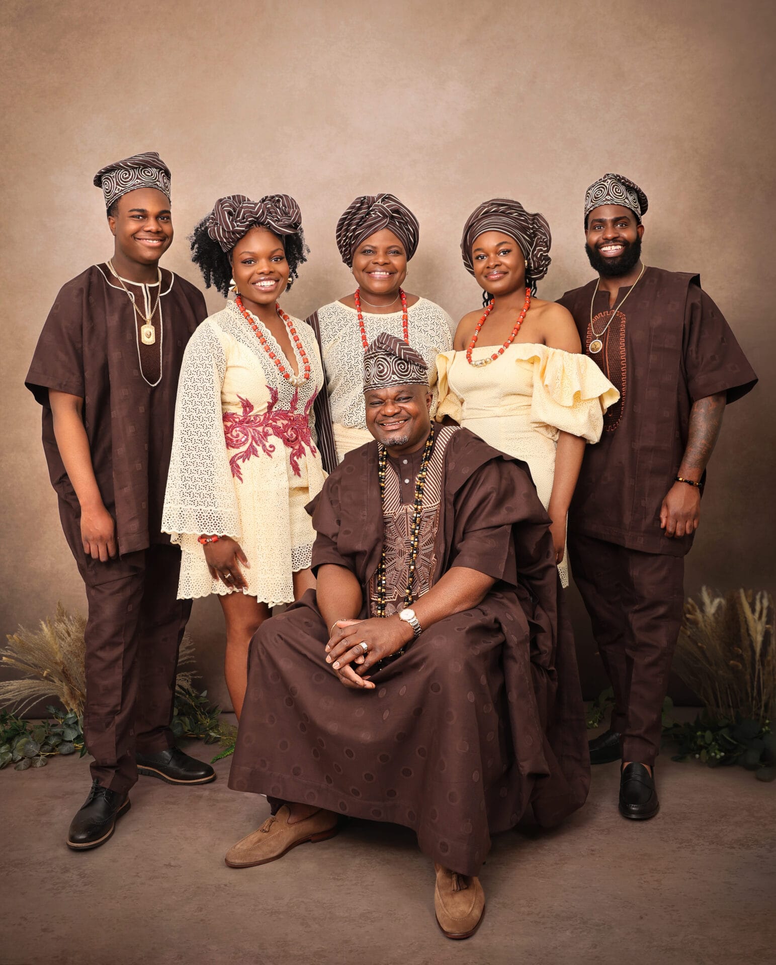 African family photographed in a London studio with traditional outfits
