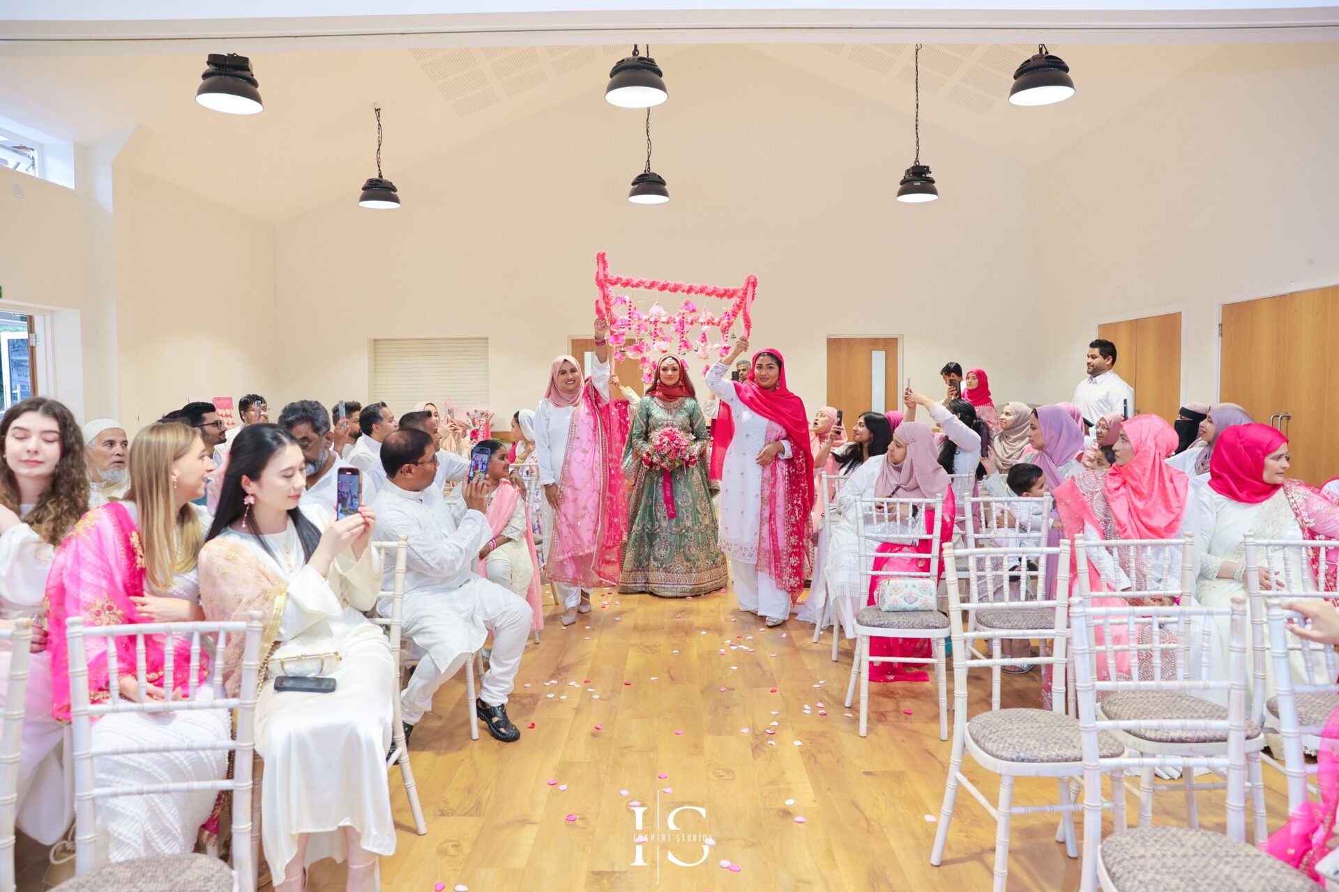 Bangladeshi Mehndi bride making her grand entrance in London.