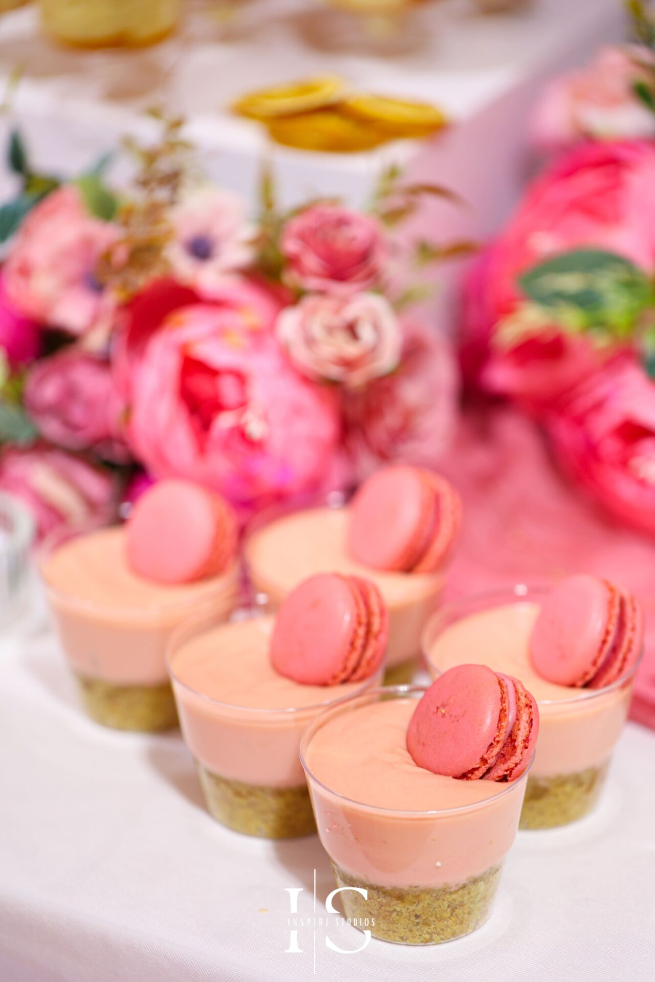 Bangladeshi wedding sweets table filled with traditional desserts.