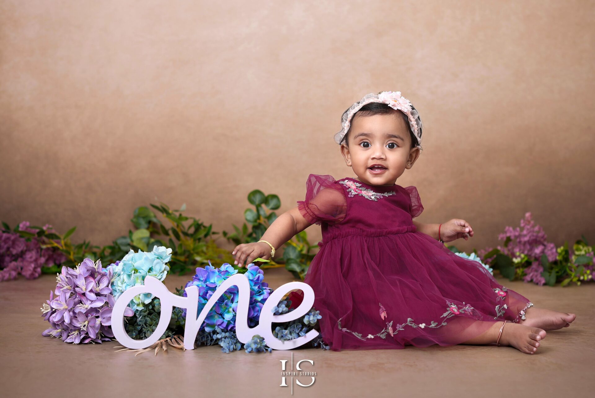 Boho themed one year birthday photoshoot for girls in London studio